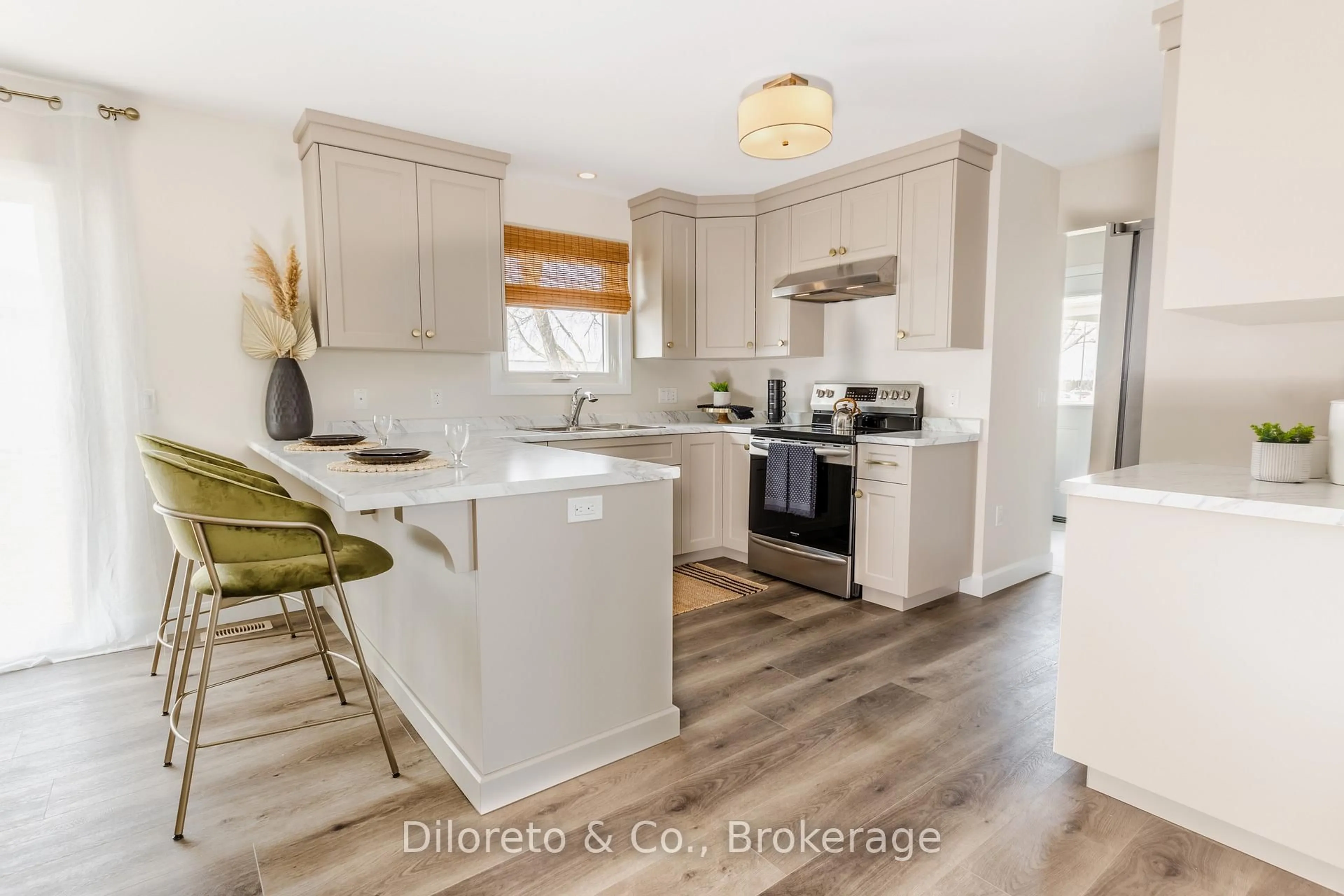Open concept kitchen, wood/laminate floor for 7307 Sideroad 5 #A, Wellington North Ontario N0G 2E0