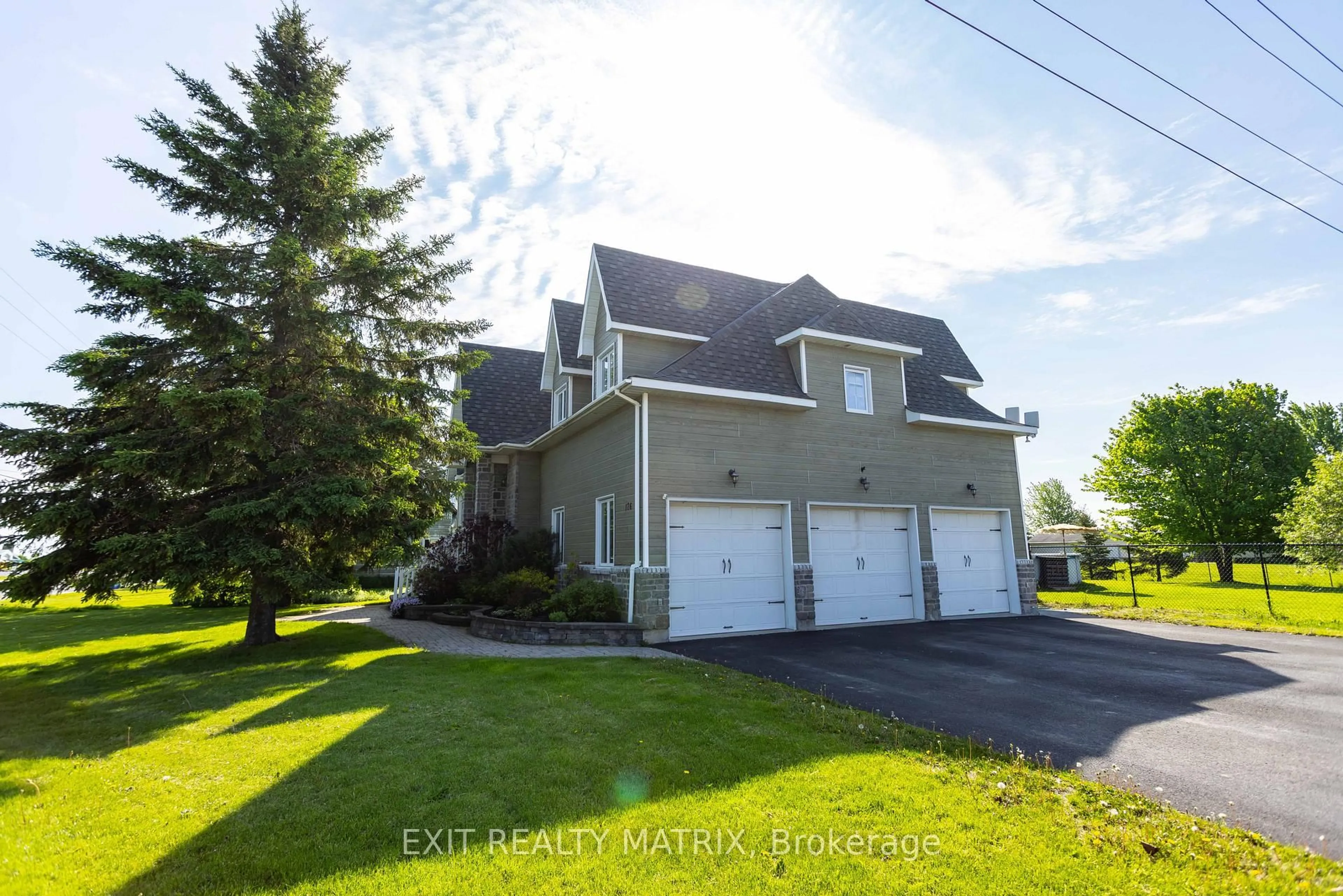 Home with vinyl exterior material, street for 176 Principale St, The Nation Ontario K0A 3C0
