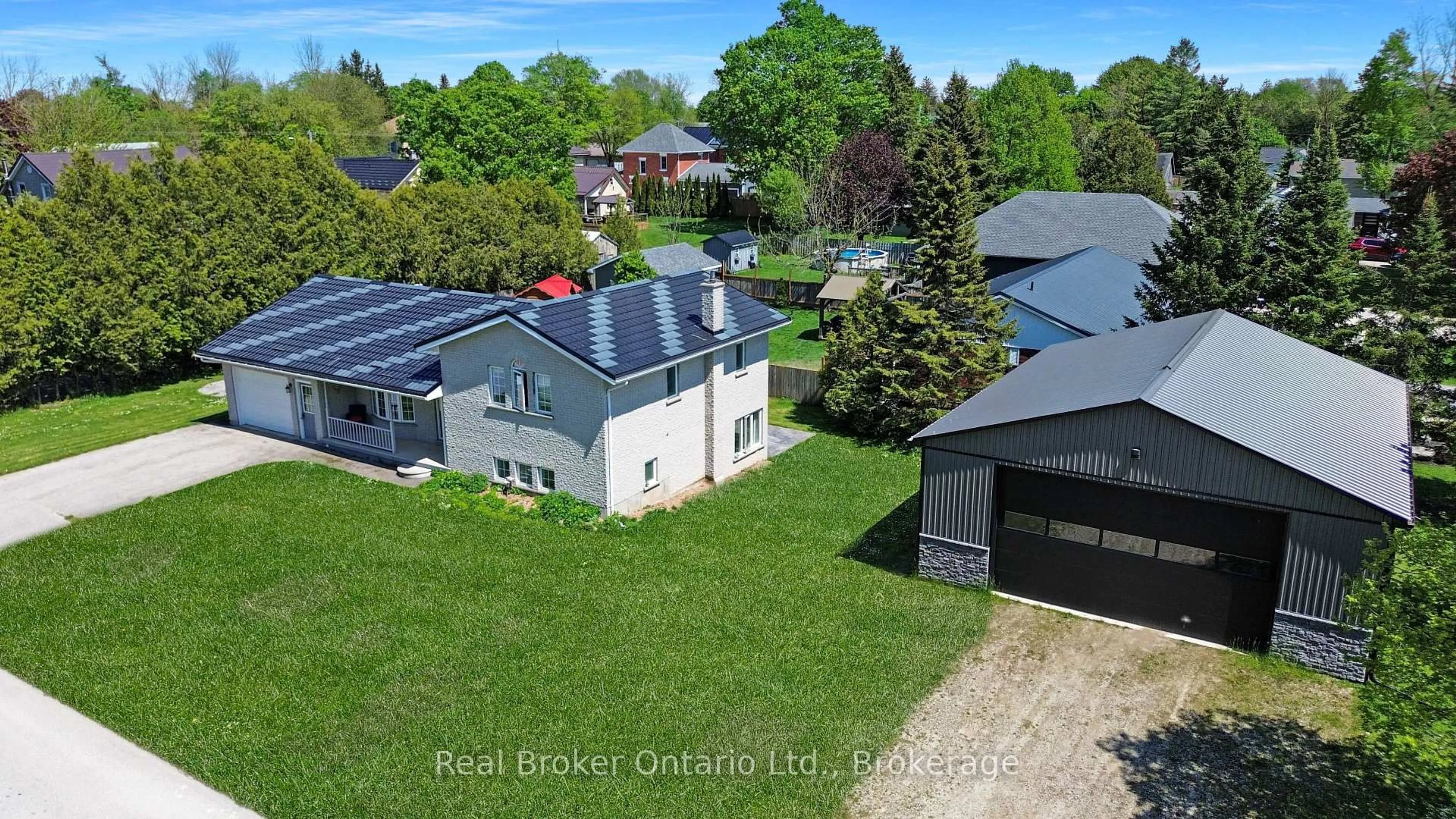 A pic from outside/outdoor area/front of a property/back of a property/a pic from drone, street for 11 James St, Minto Ontario N0G 1M0