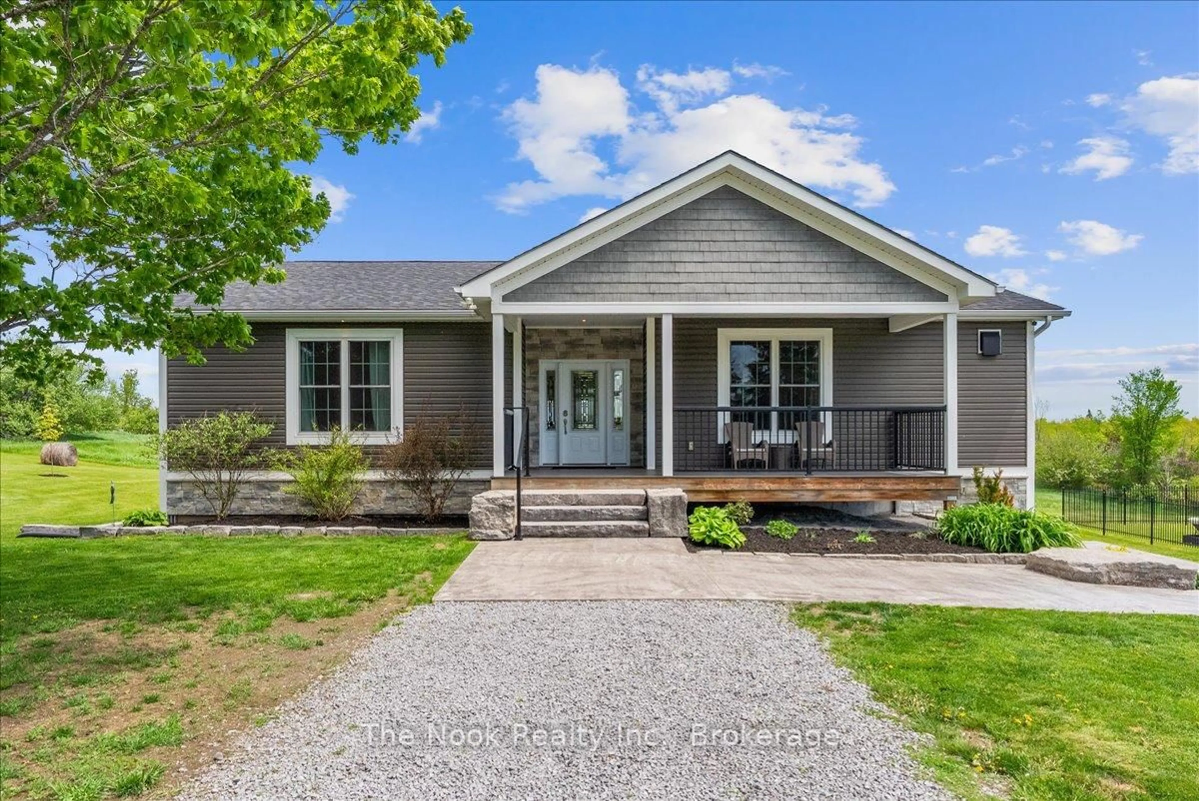Home with vinyl exterior material, street for 389 12th Line Rd Dummer Rd, Douro-Dummer Ontario K0L 2V0
