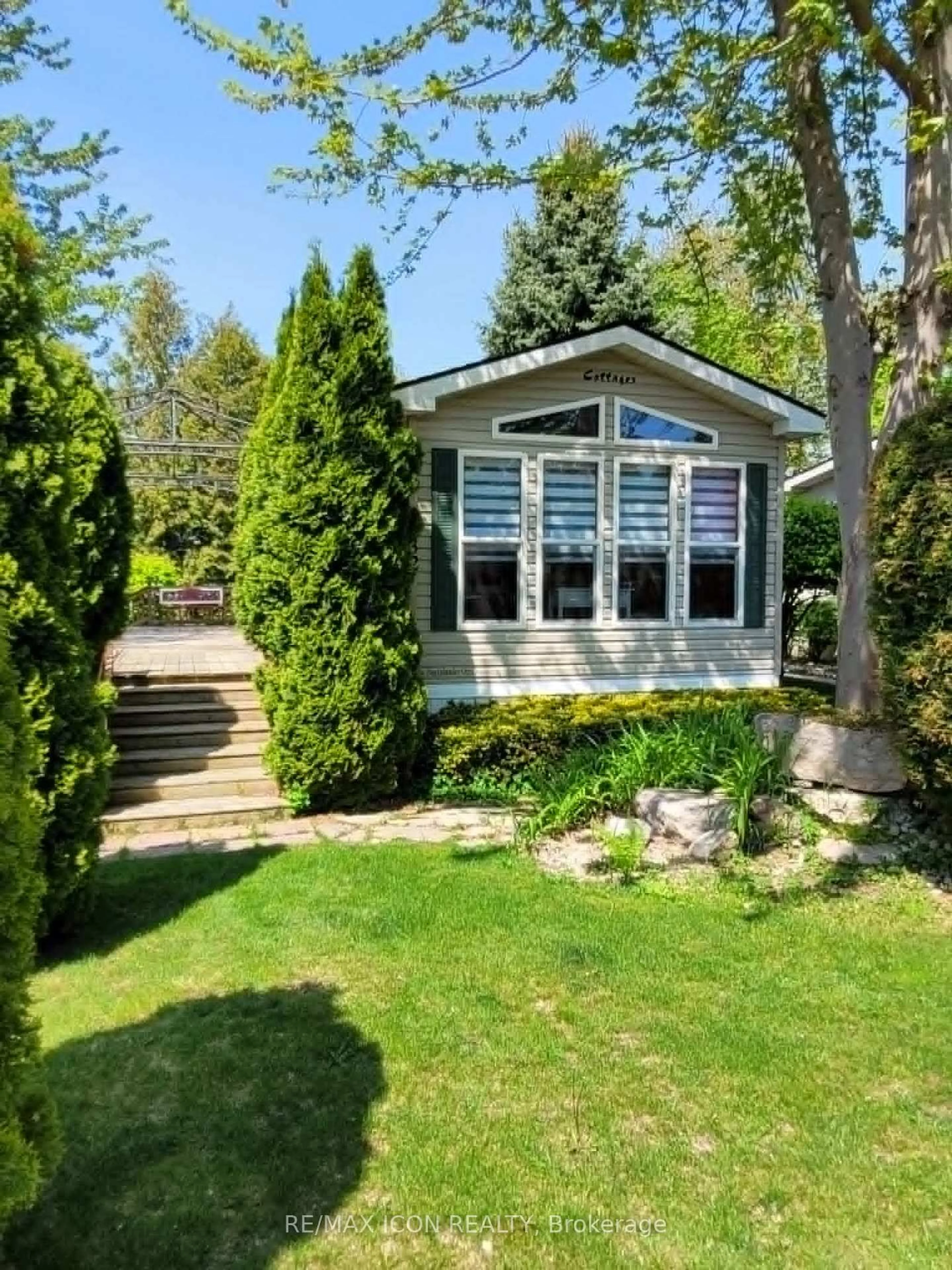 Home with vinyl exterior material, street for 77307 Bluewater Highway #32 Rowan Rd, Bluewater Ontario N0M 1G0