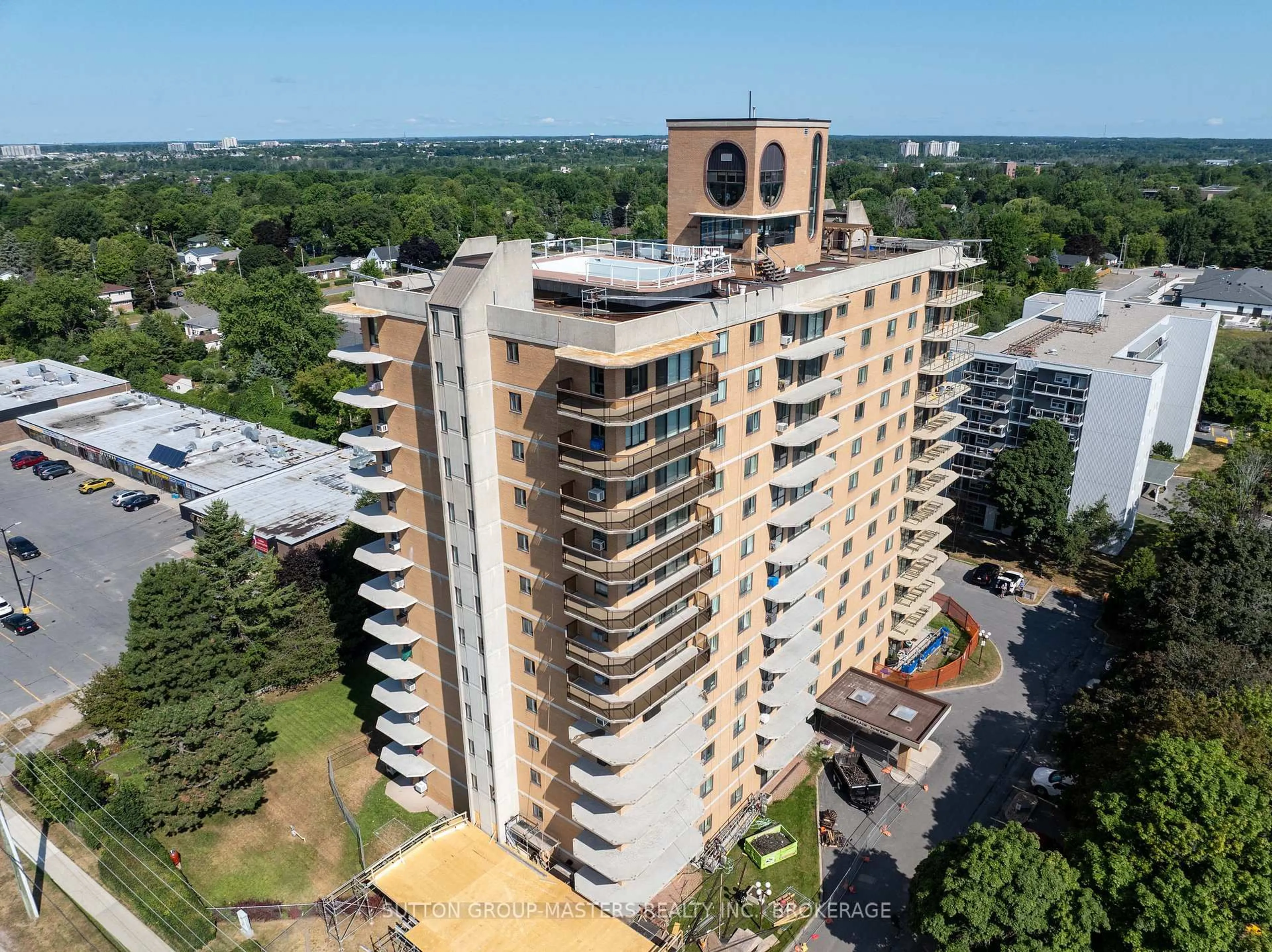 A pic from outside/outdoor area/front of a property/back of a property/a pic from drone, building for 257 Bath Rd #405, Kingston Ontario K7M 7T3