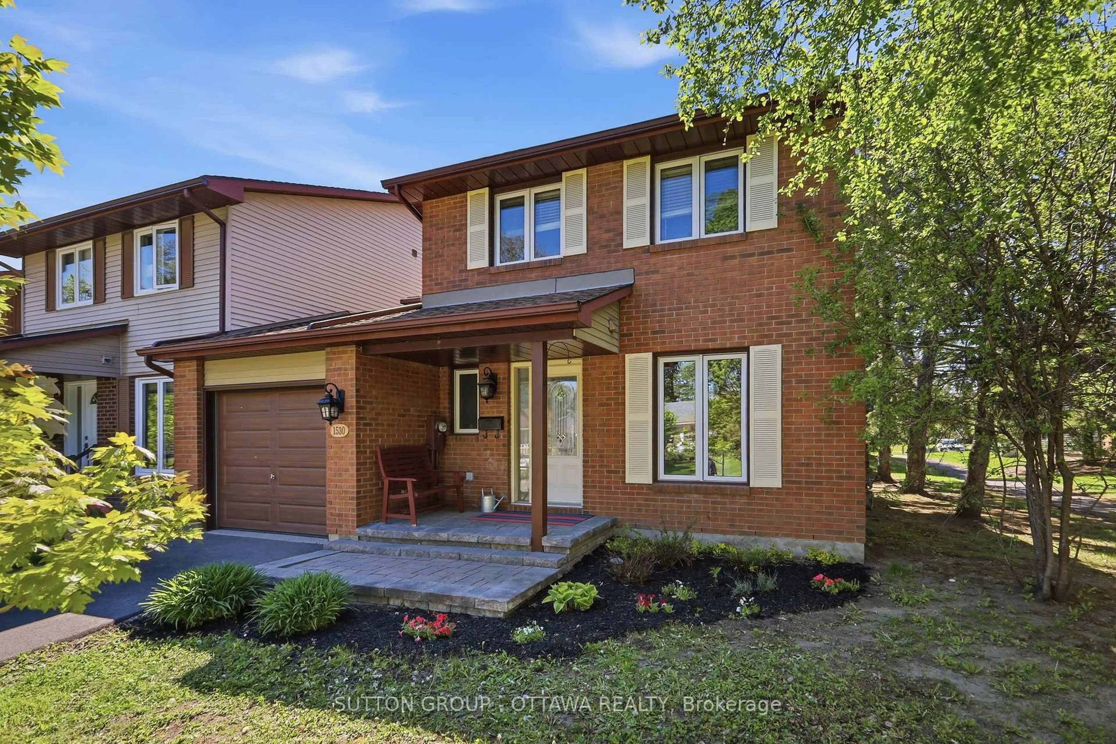 Home with brick exterior material, street for 1530 Mimosa Ave, Ottawa Ontario K1G 4C9