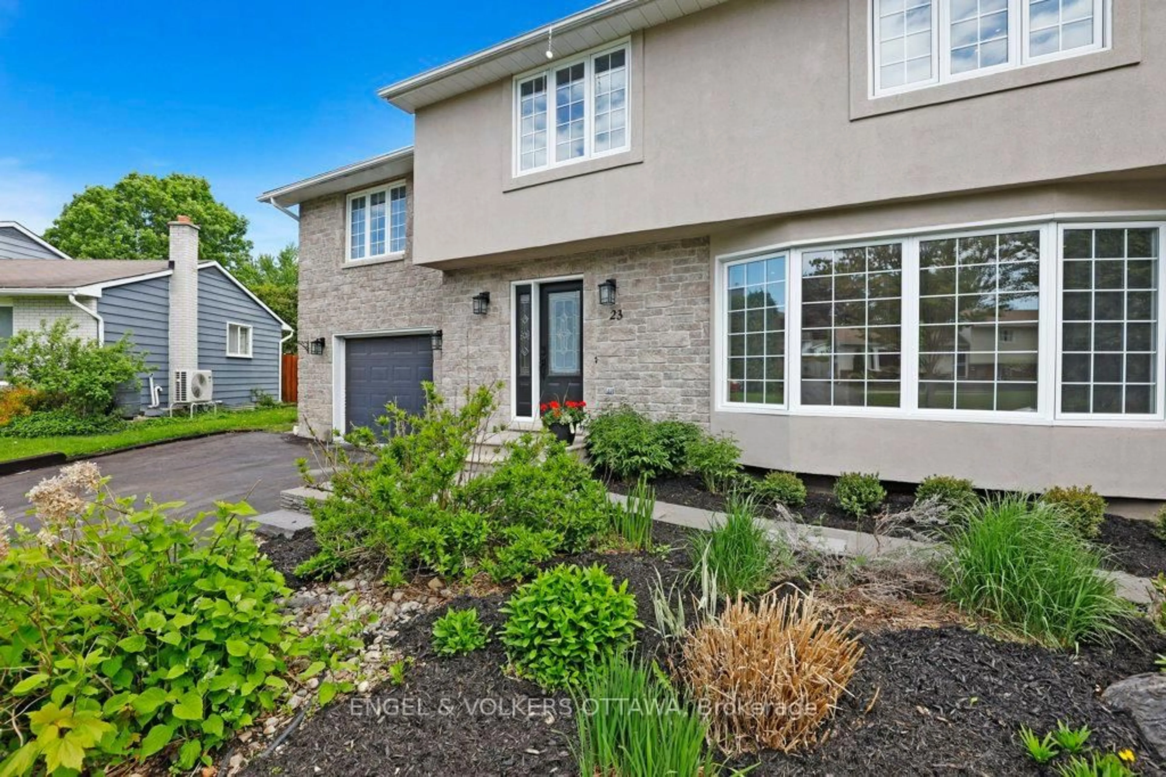 Home with brick exterior material, street for 23 Biscayne Cres, Ottawa Ontario K2E 5R9