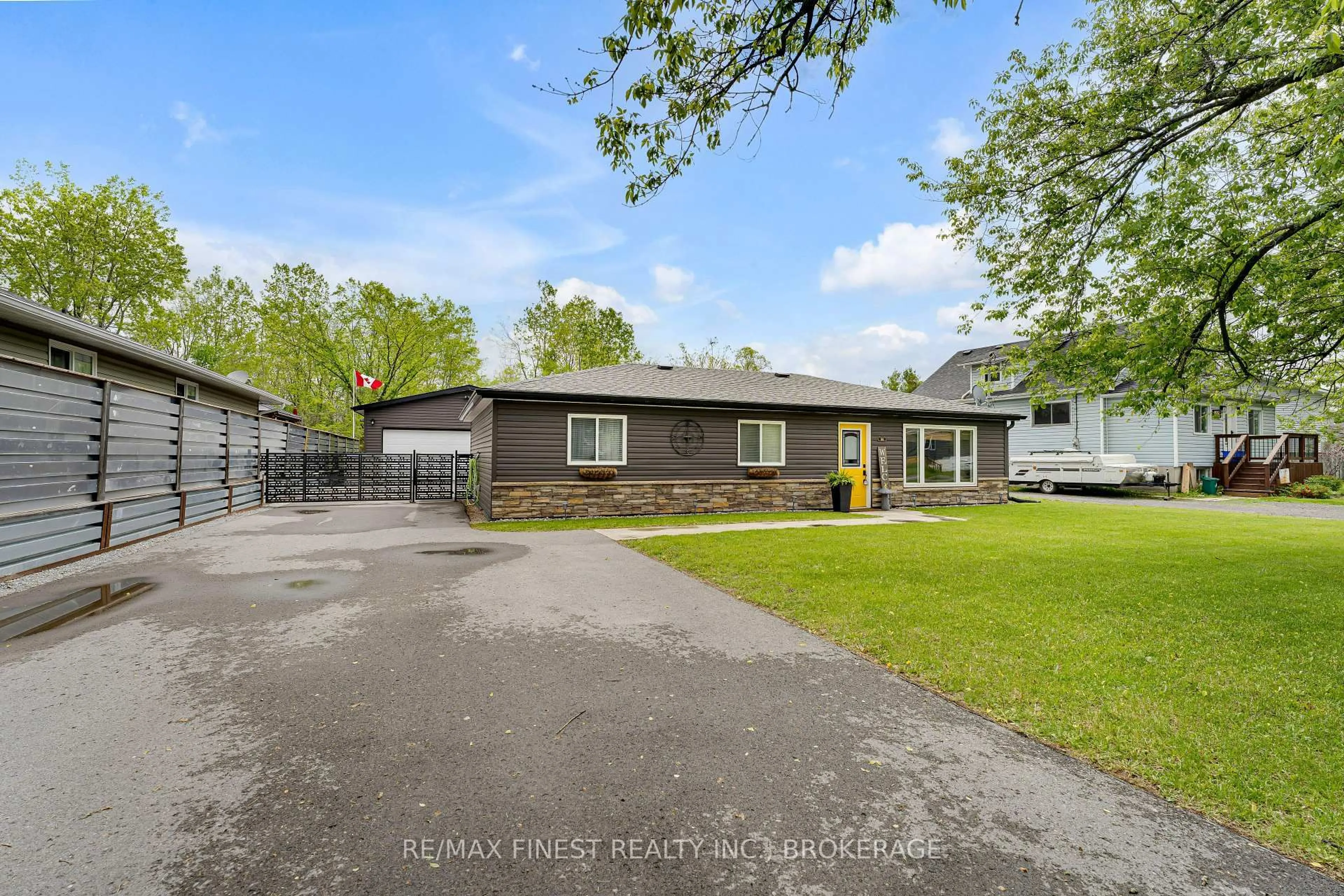 A pic from outside/outdoor area/front of a property/back of a property/a pic from drone, street for 98 Factory St, Bissett Creek Ontario K0H 2H0