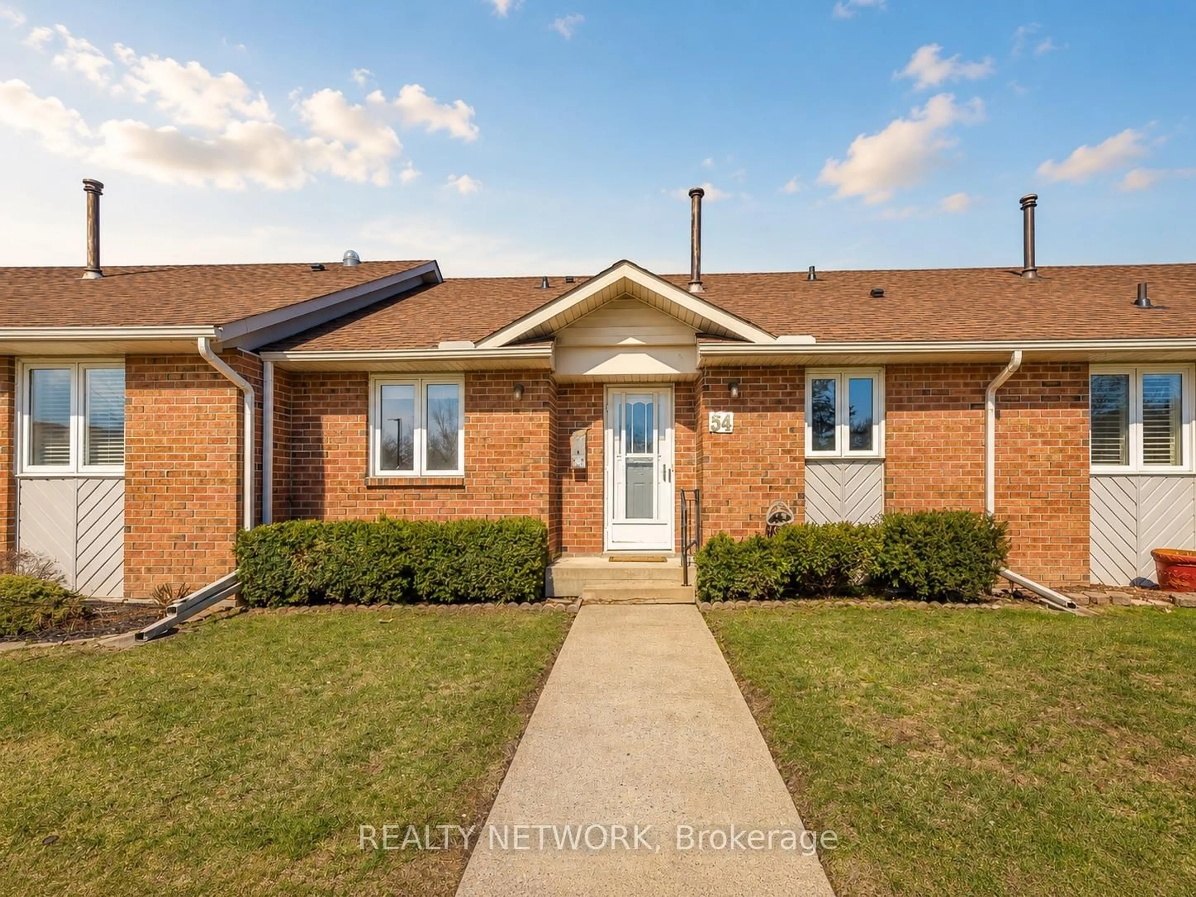 Home with brick exterior material, street for 122 Bunting Rd #54, St. Catharines Ontario L2P 3X7