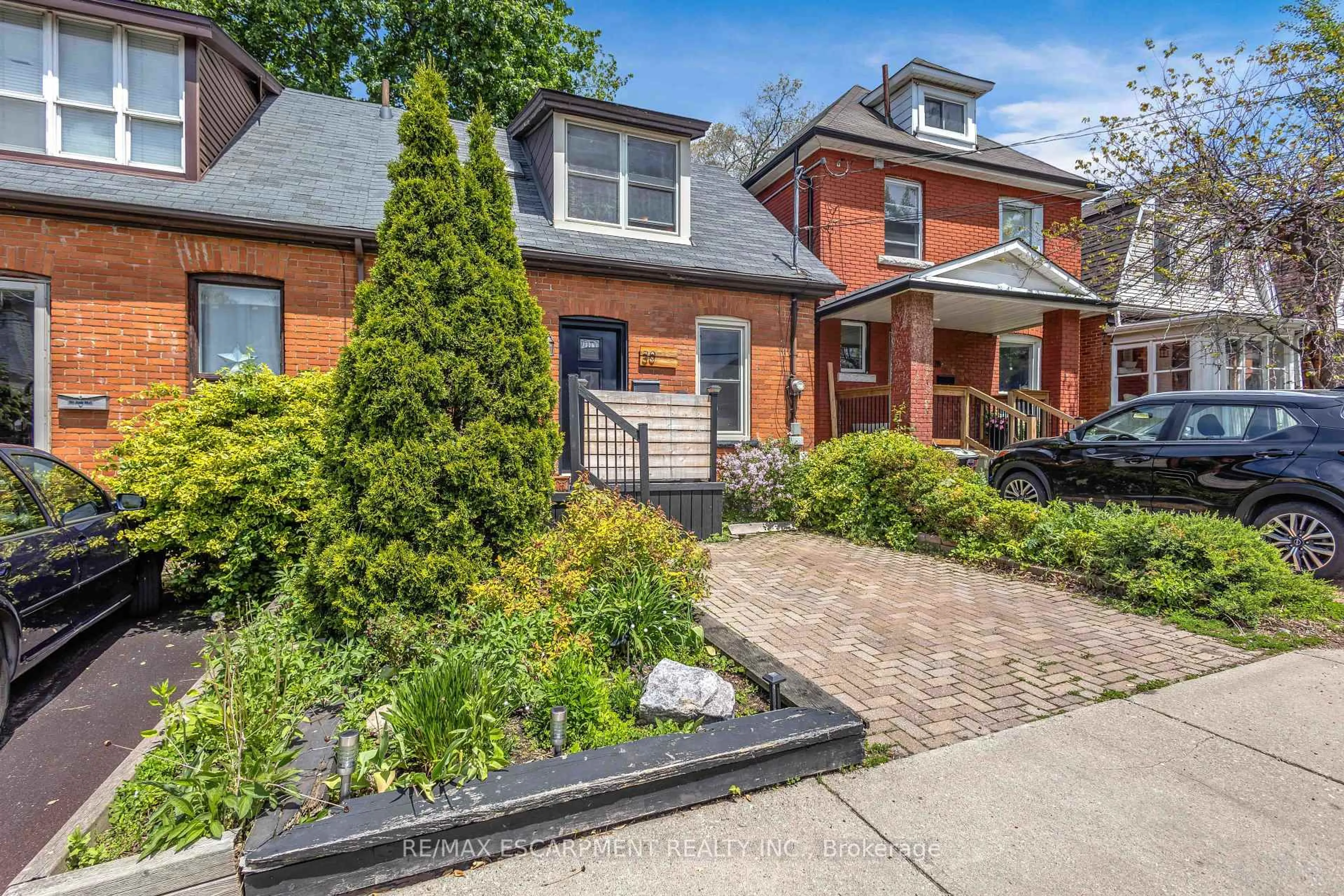 Home with brick exterior material, street for 30 Sunset Ave, Hamilton Ontario L8R 1V6