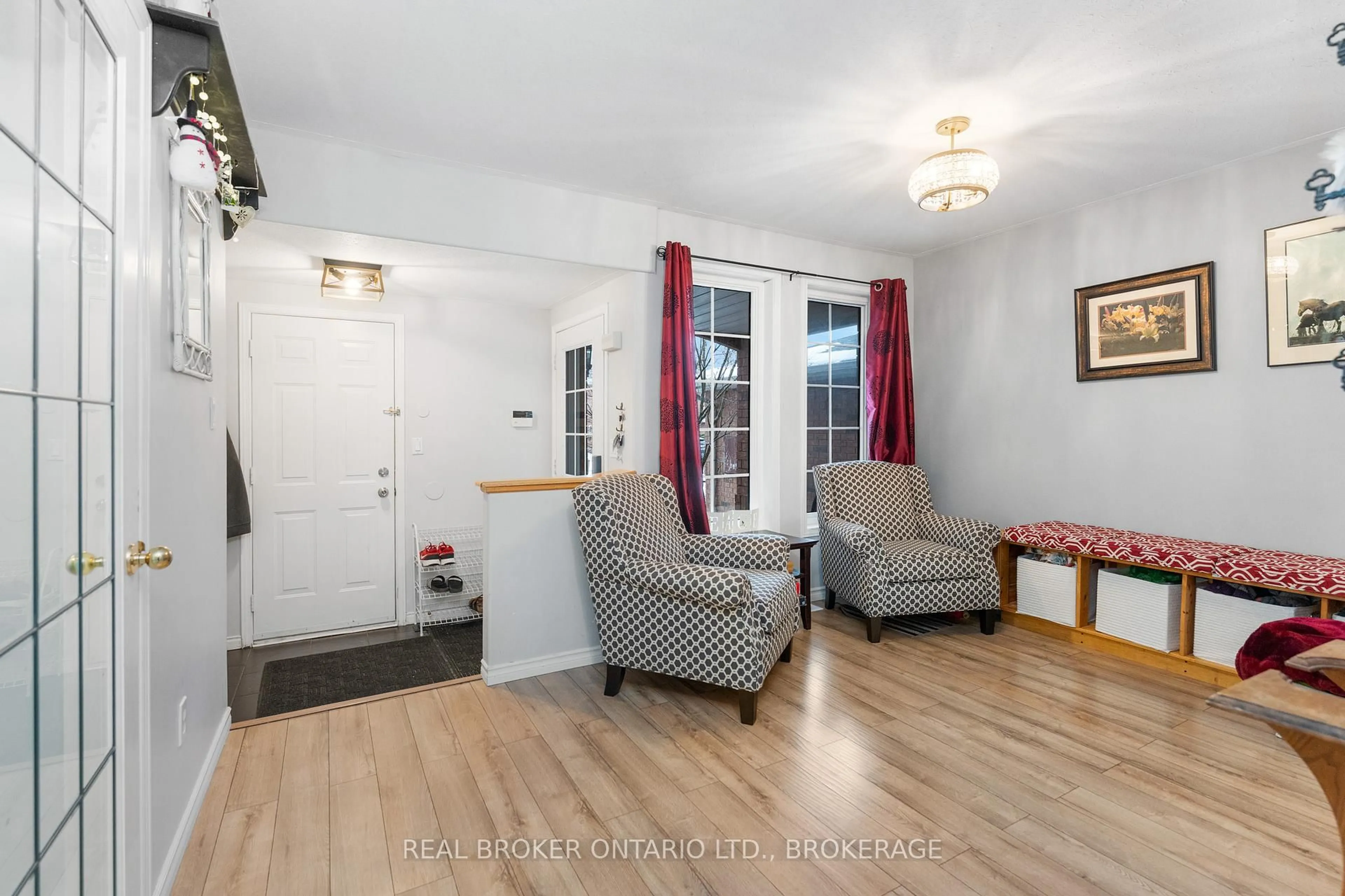 Living room with furniture, wood/laminate floor for 264 Ellesmeer Ave, Kingston Ontario K7P 3C6