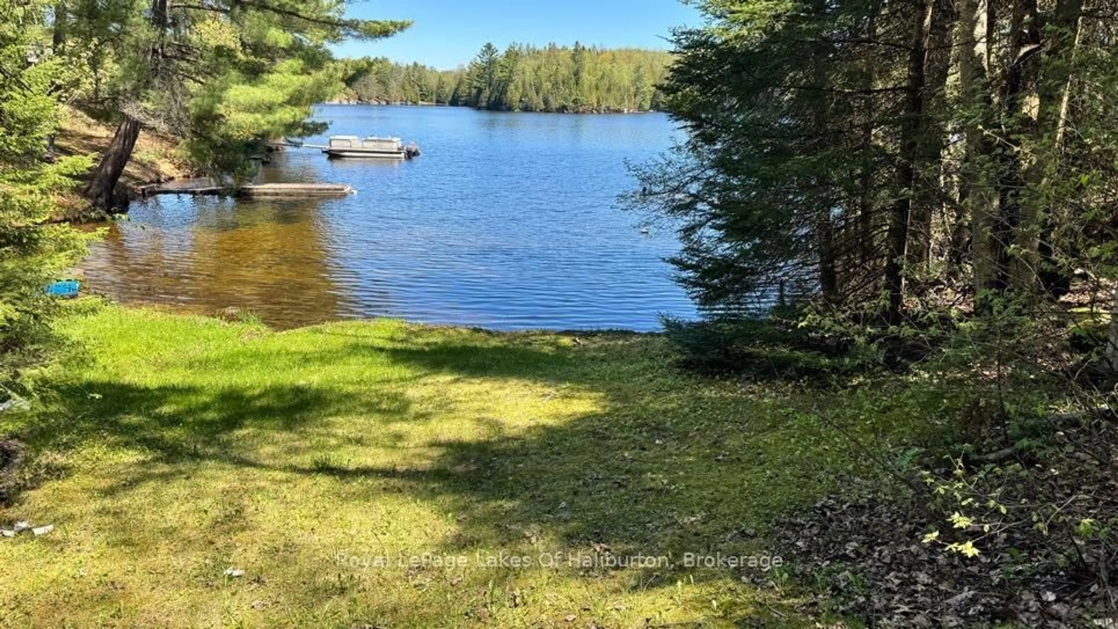A pic from outside/outdoor area/front of a property/back of a property/a pic from drone, water/lake/river/ocean view for 1099 Yellow Rock Dr, Highlands East Ontario K0M 1R0