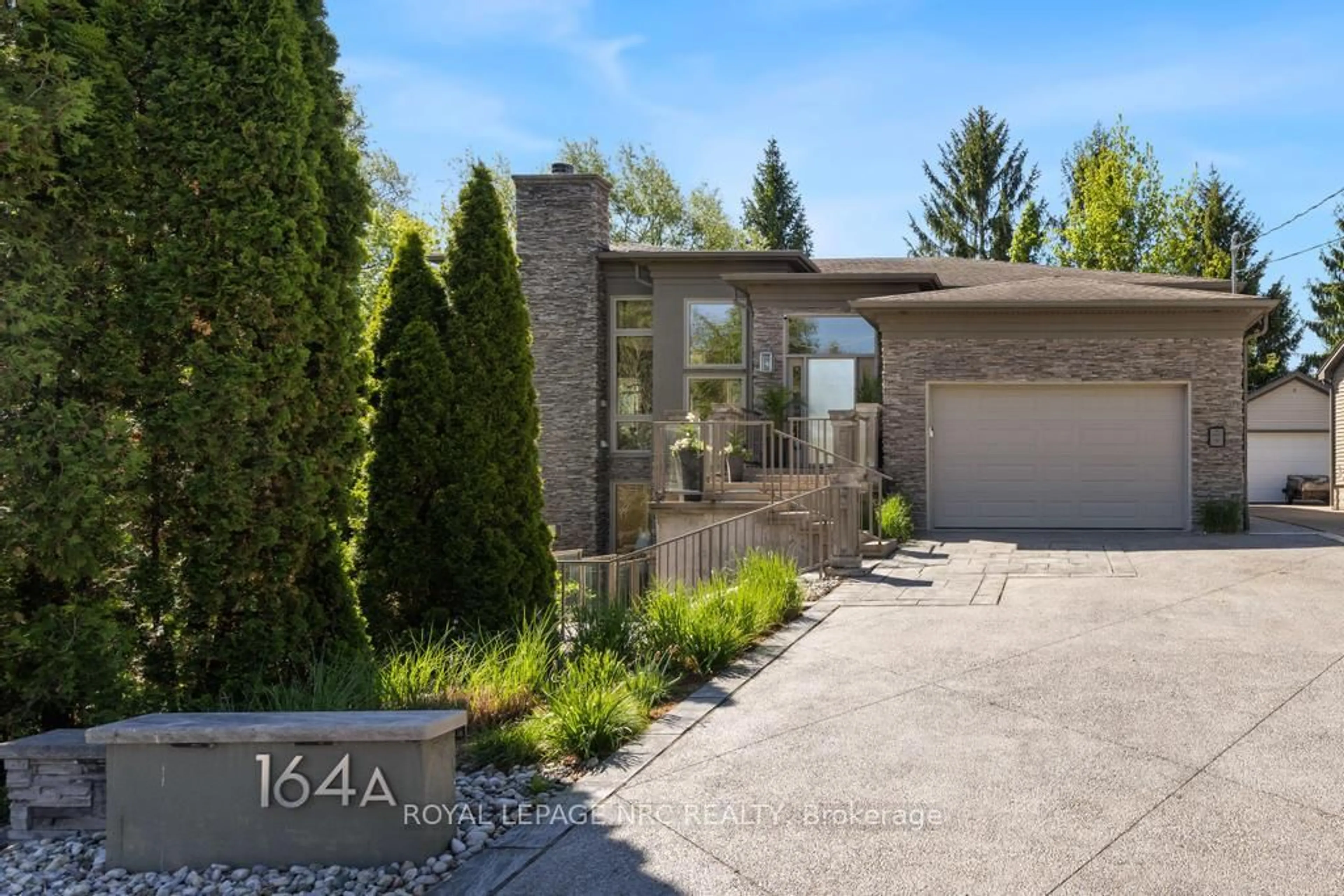 Home with brick exterior material, street for 164A Lakeshore Rd, St. Catharines Ontario L2N 2V1