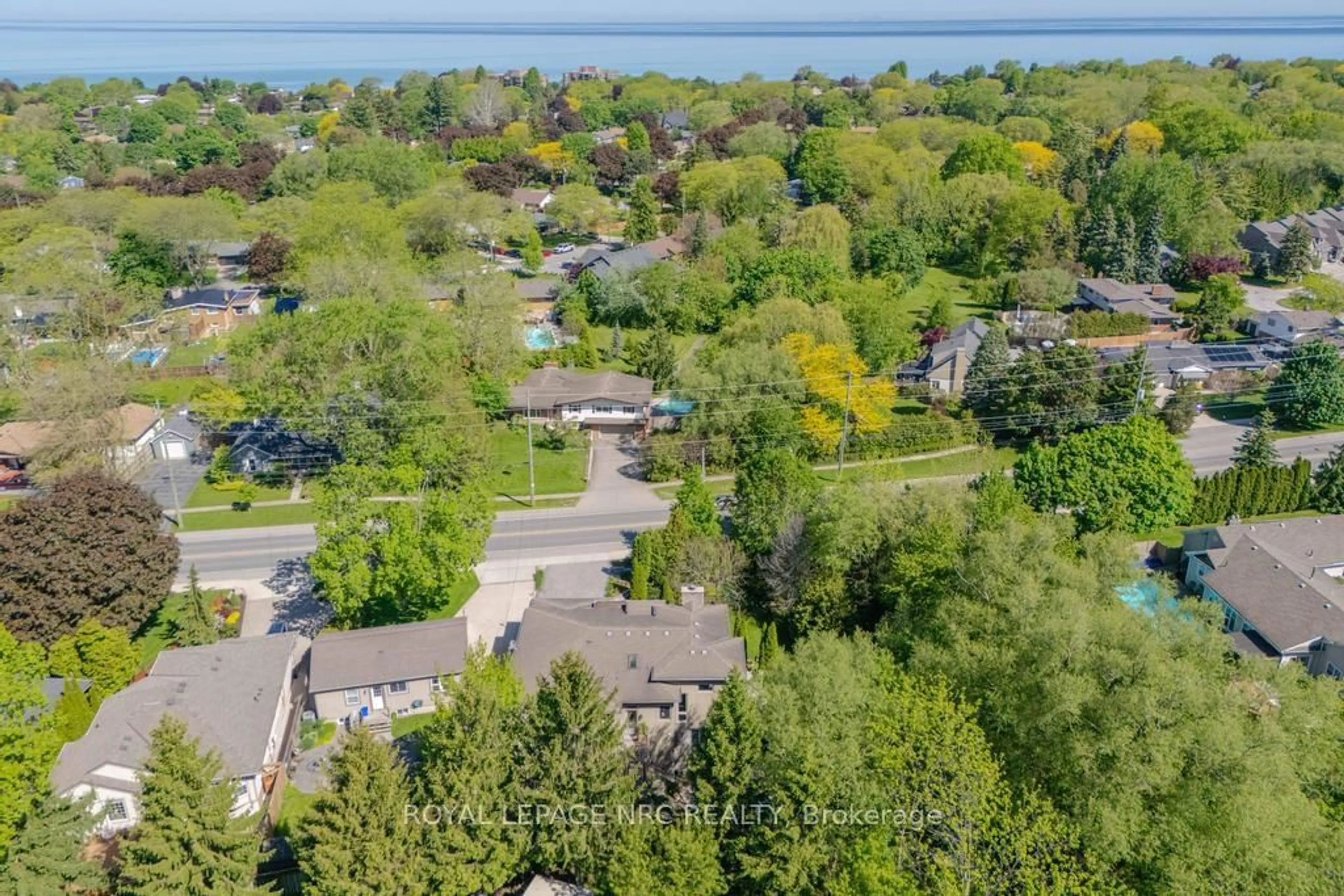 A pic from outside/outdoor area/front of a property/back of a property/a pic from drone, water/lake/river/ocean view for 164A Lakeshore Rd, St. Catharines Ontario L2N 2V1