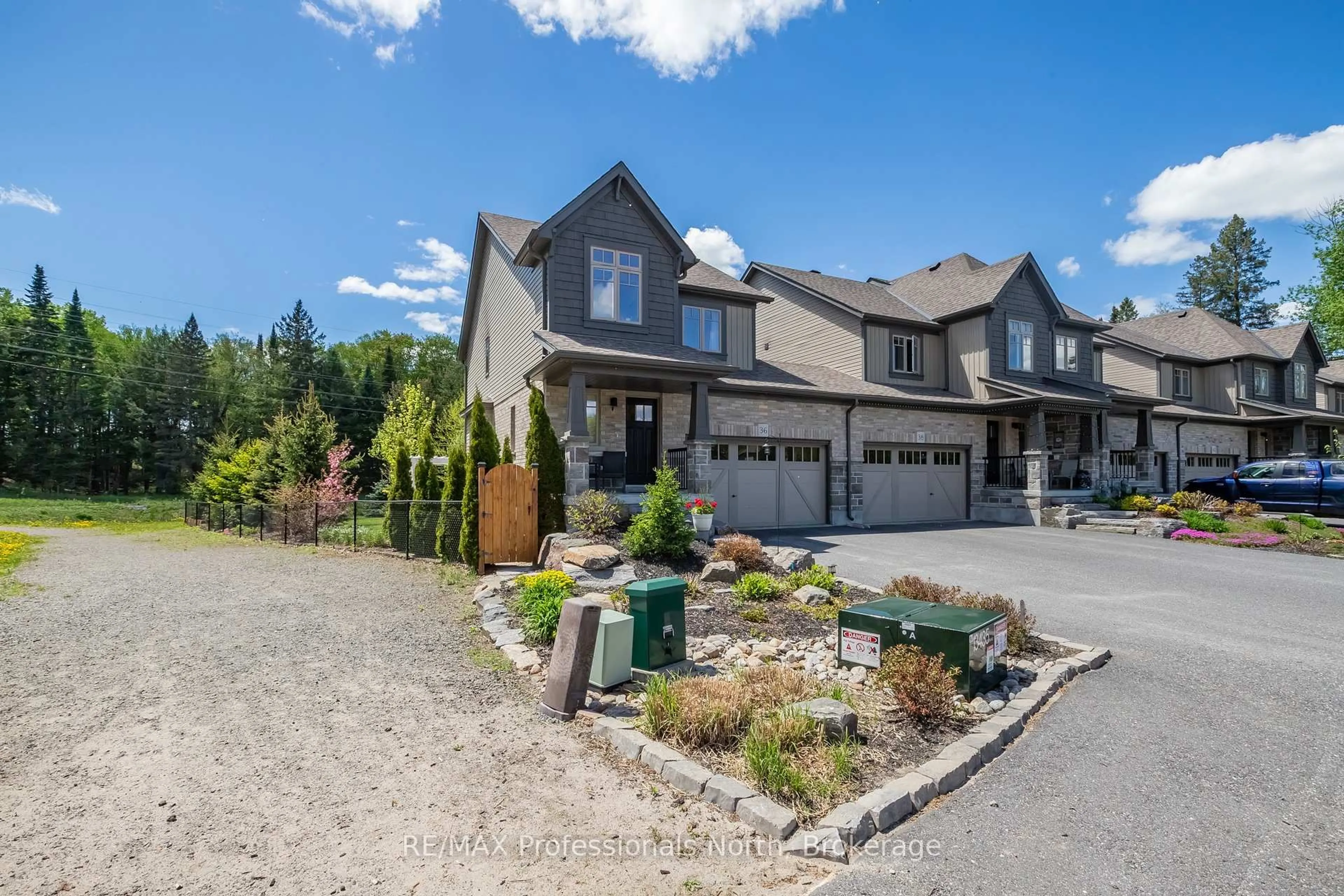 A pic from outside/outdoor area/front of a property/back of a property/a pic from drone, unknown for 36 Spalding Cres, Huntsville Ontario P1H 1C9