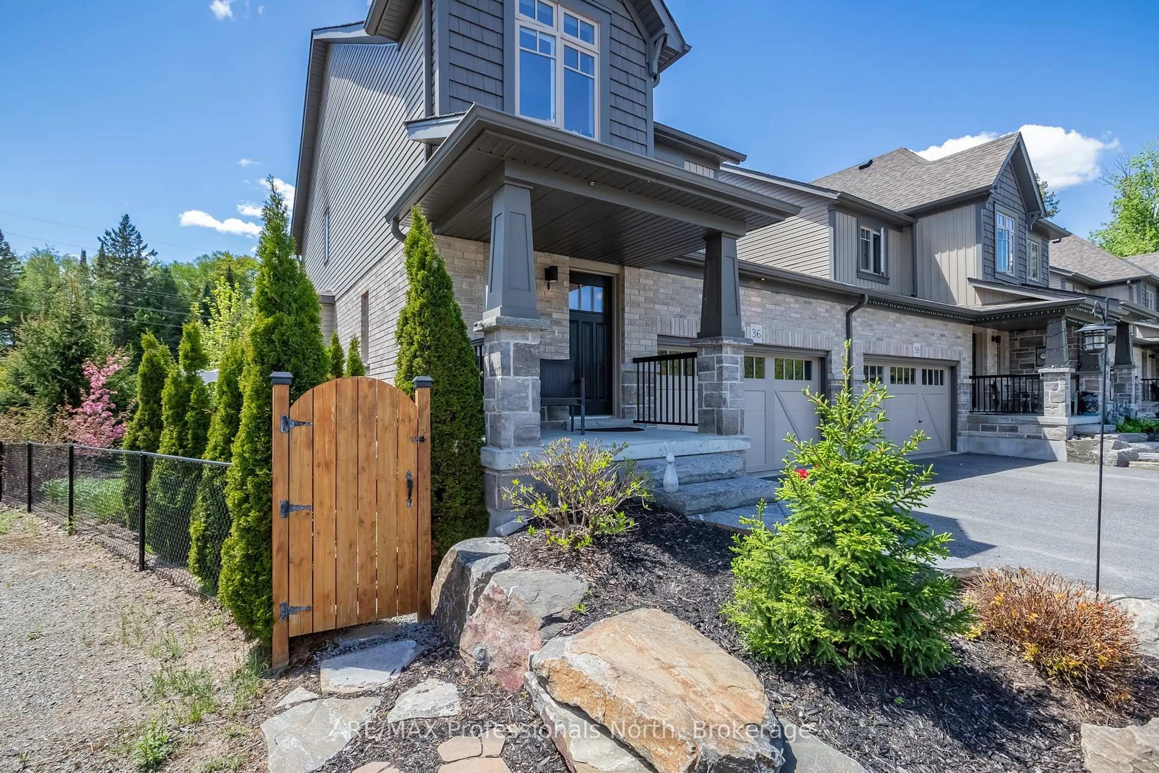 Home with brick exterior material, street for 36 Spalding Cres, Huntsville Ontario P1H 1C9