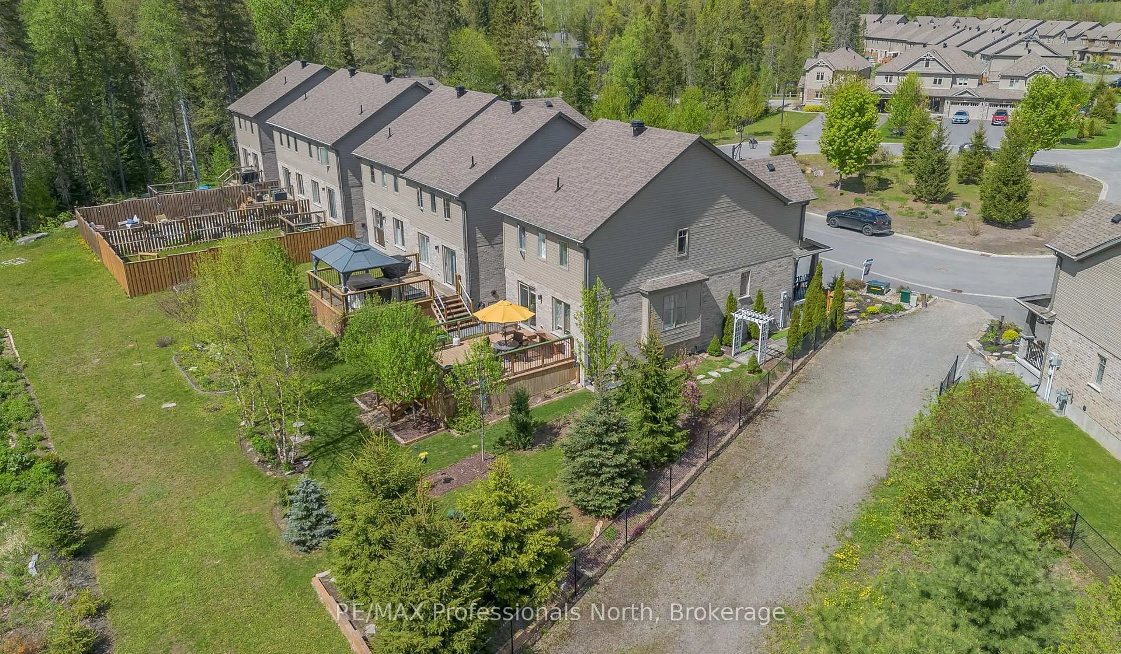 A pic from outside/outdoor area/front of a property/back of a property/a pic from drone, street for 36 Spalding Cres, Huntsville Ontario P1H 1C9