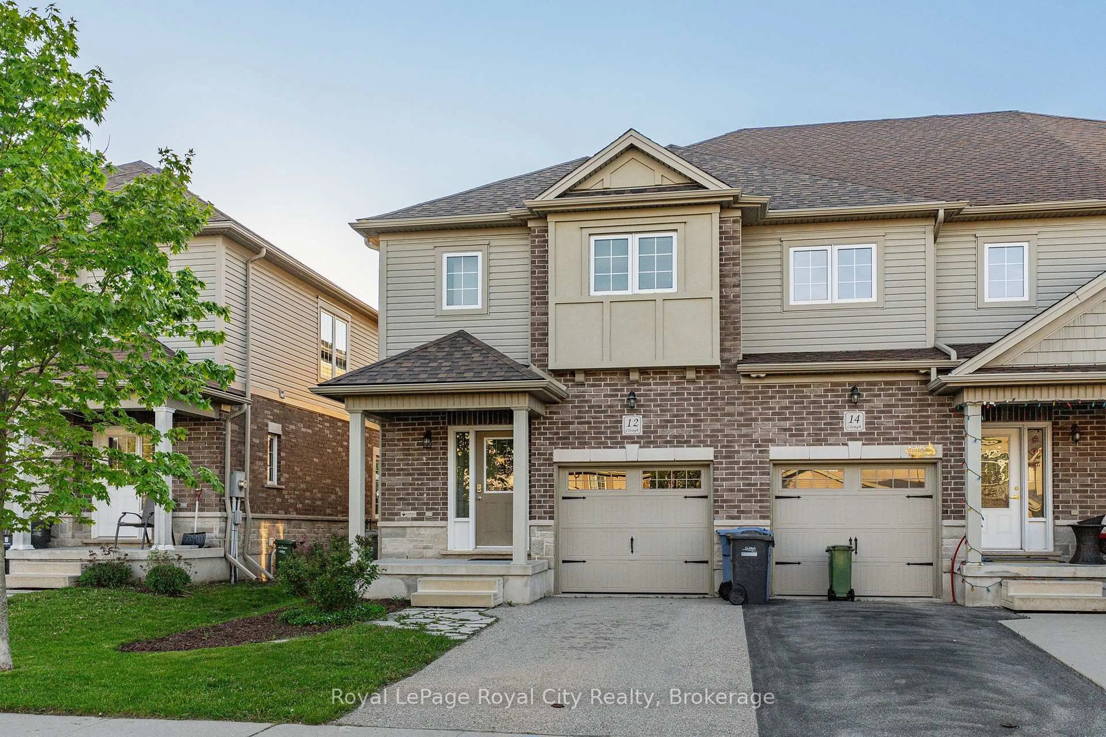 Home with brick exterior material, street for 12 Clough Cres, Guelph Ontario N1L 0H9