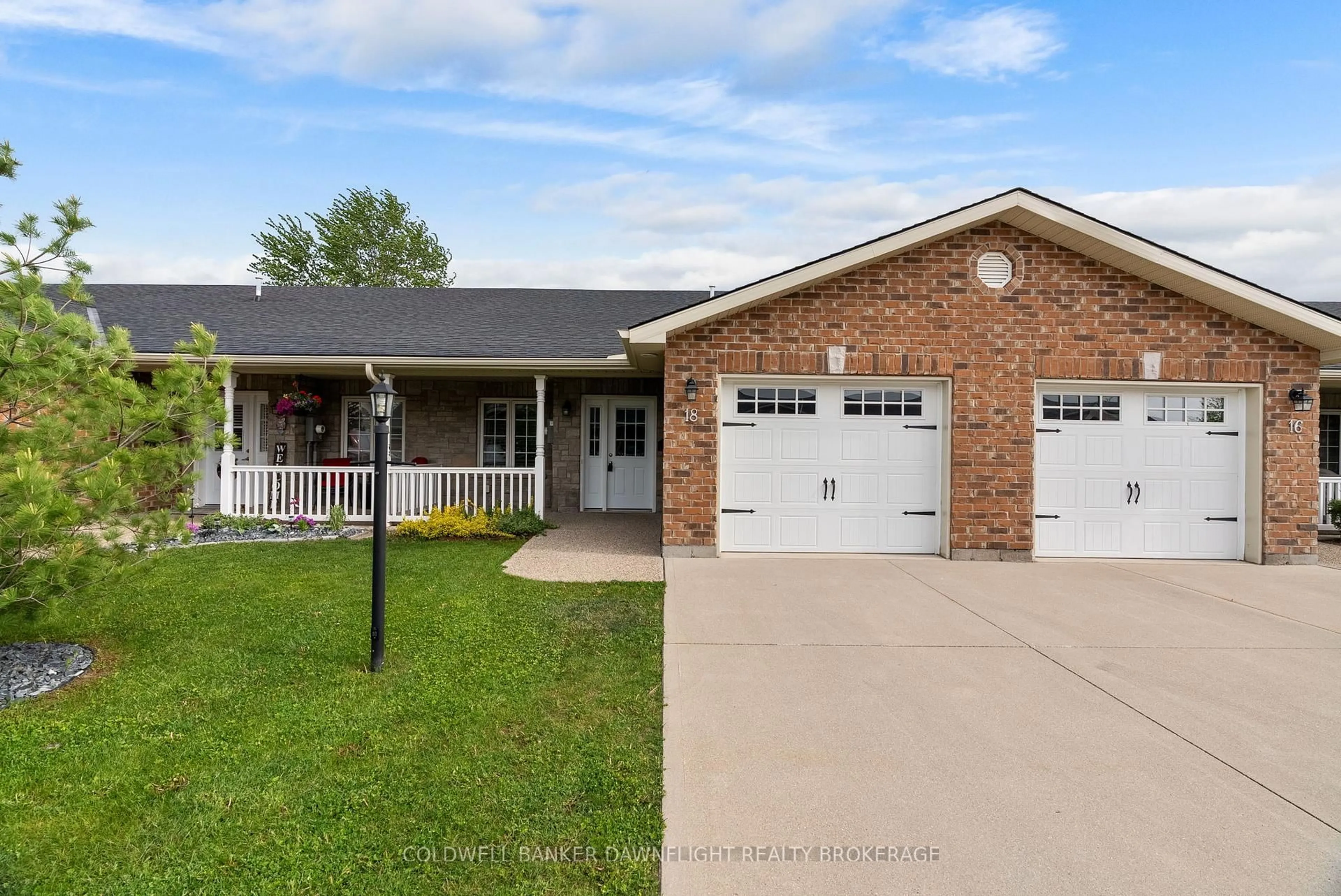 Home with brick exterior material, street for 18 Devon Dr, South Huron Ontario N0M 1S3