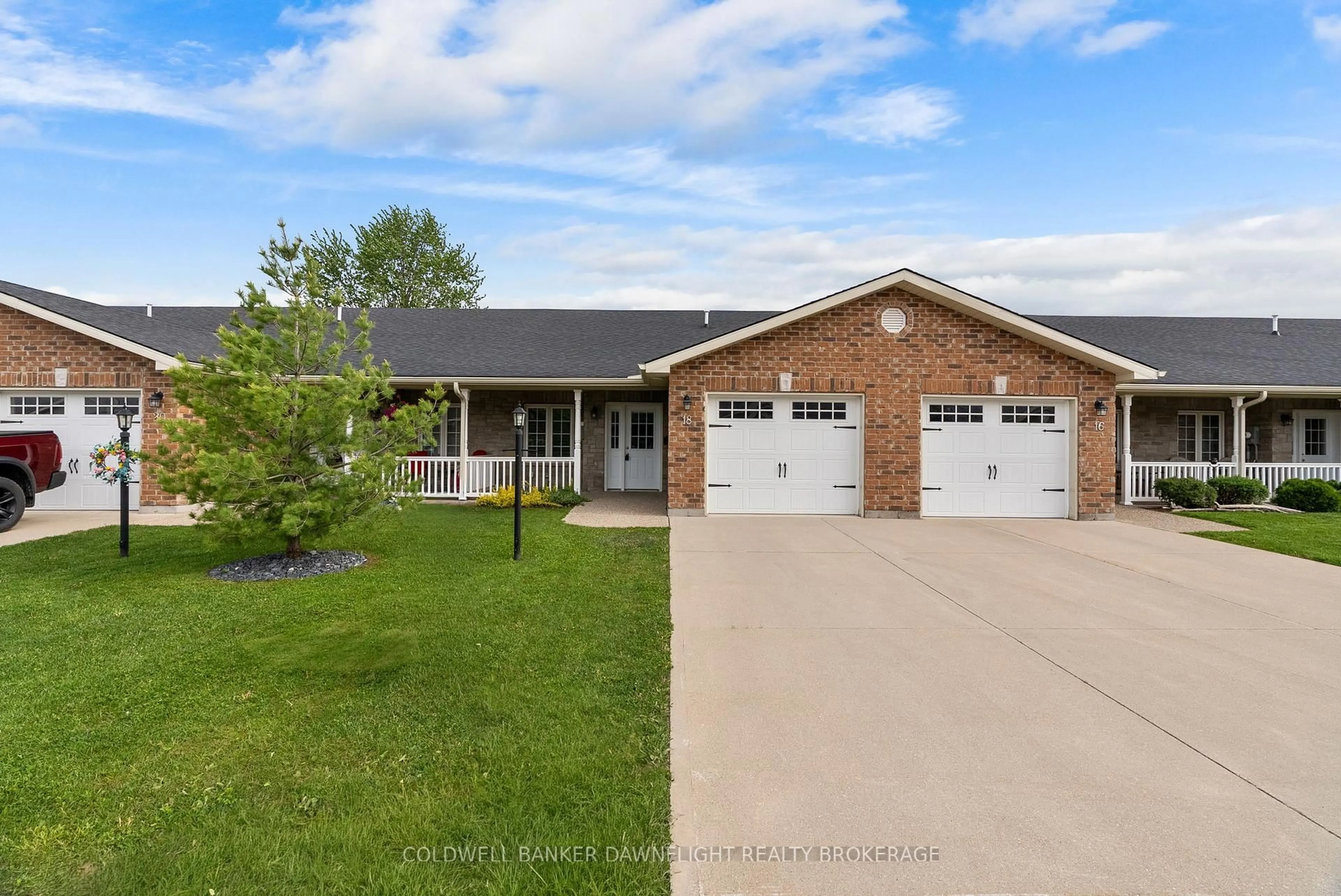 Home with brick exterior material, street for 18 Devon Dr, South Huron Ontario N0M 1S3