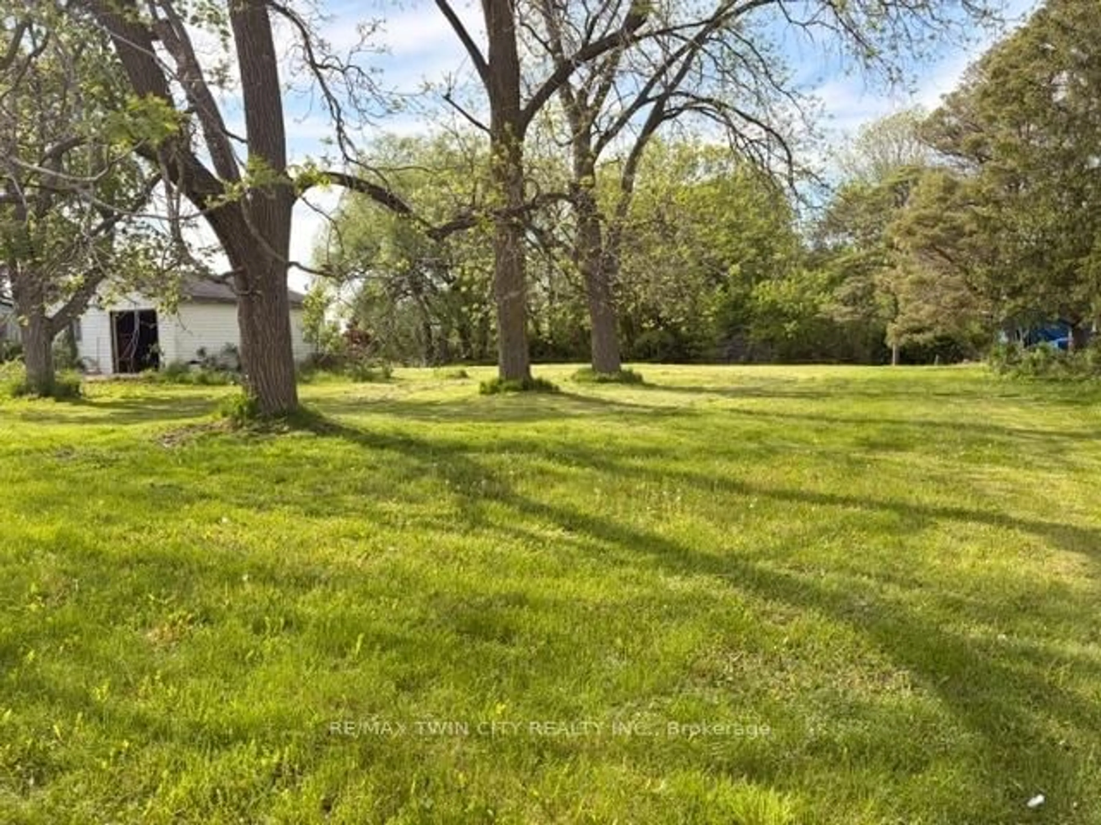 A pic from outside/outdoor area/front of a property/back of a property/a pic from drone, forest/trees view for 37 Young St, Blandford-Blenheim Ontario N0J 1S0