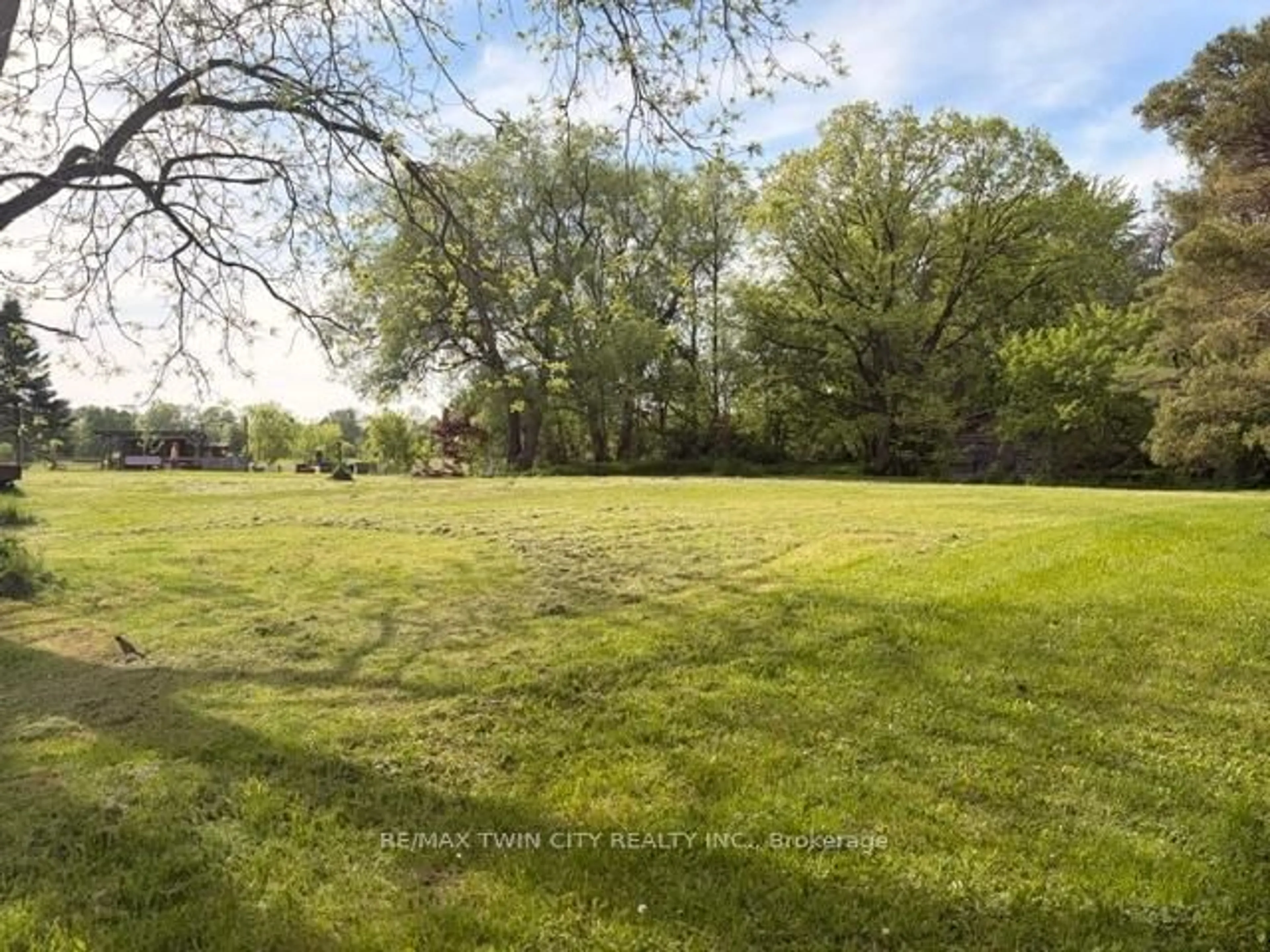 A pic from outside/outdoor area/front of a property/back of a property/a pic from drone, forest/trees view for 37 Young St, Blandford-Blenheim Ontario N0J 1S0