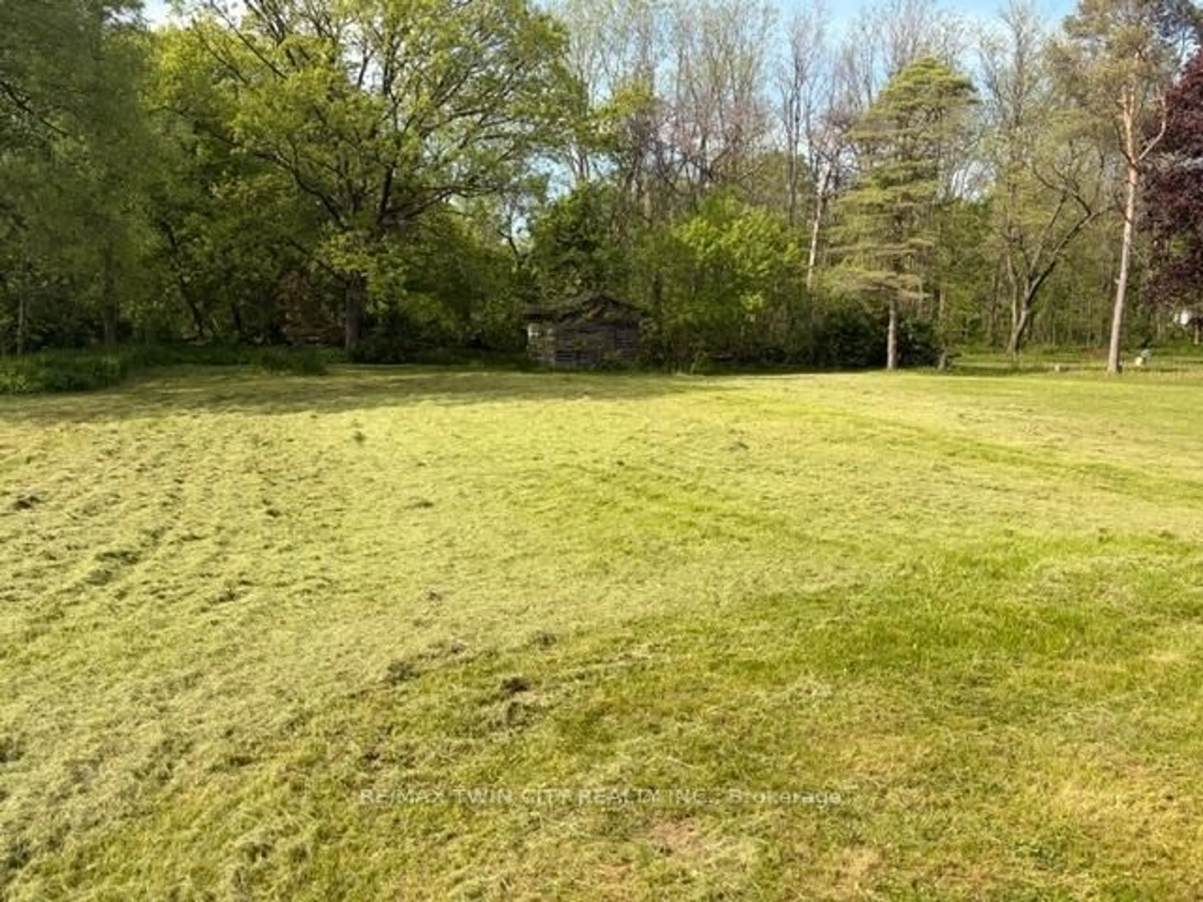 A pic from outside/outdoor area/front of a property/back of a property/a pic from drone, forest/trees view for 37 Young St, Blandford-Blenheim Ontario N0J 1S0