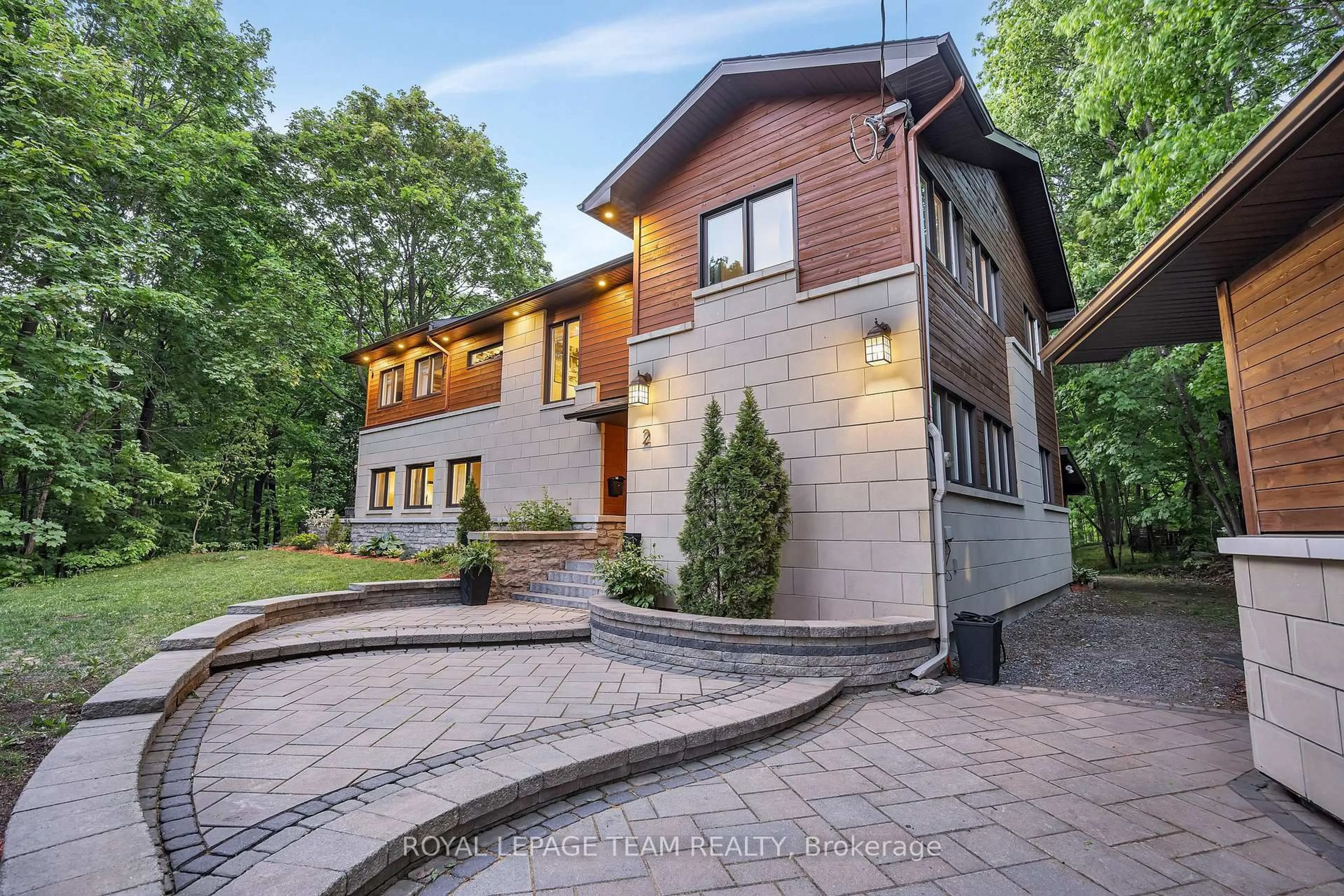 Home with brick exterior material, street for 2 Fairhaven Way, Ottawa Ontario K1K 0R3