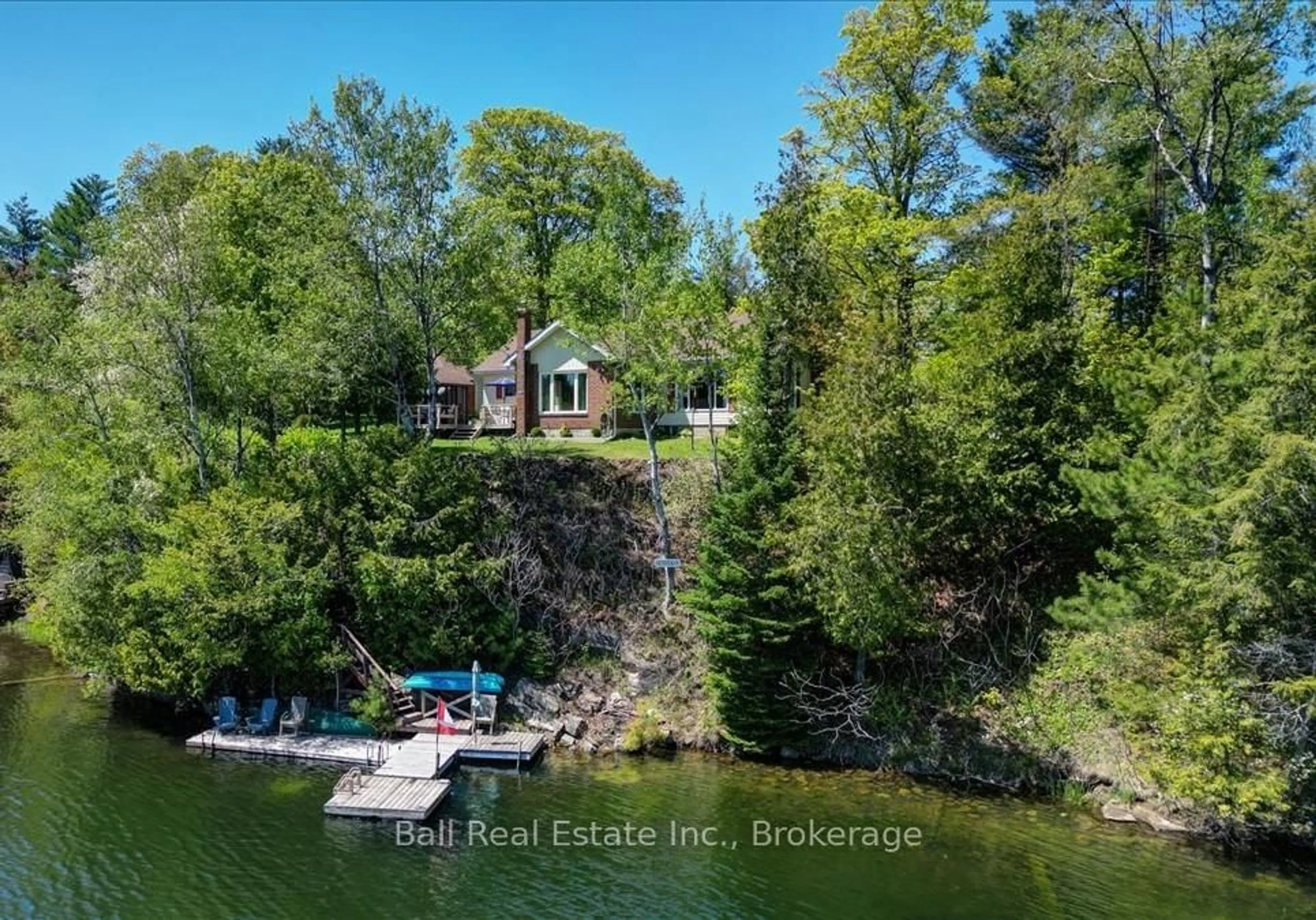 A pic from outside/outdoor area/front of a property/back of a property/a pic from drone, water/lake/river/ocean view for 29 Brown Lane, Bancroft Ontario K0L 1C0