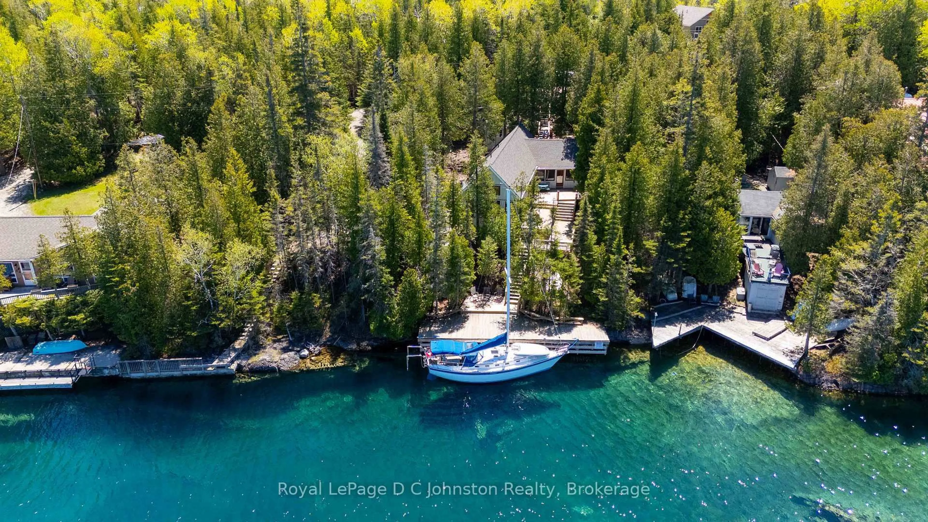 A pic from outside/outdoor area/front of a property/back of a property/a pic from drone, water/lake/river/ocean view for 124 Big Tub Rd, Northern Bruce Peninsula Ontario N0H 2R0