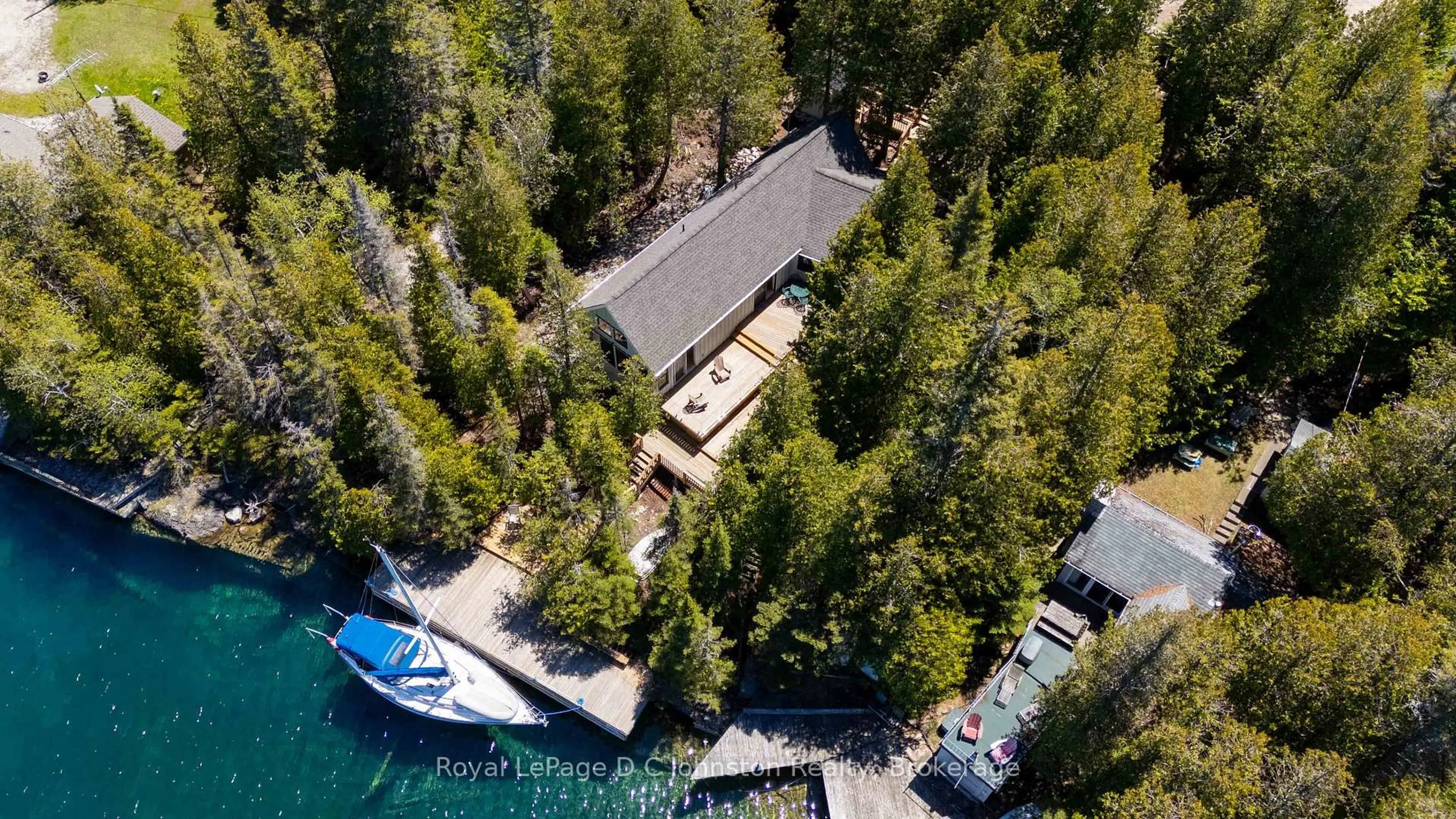 A pic from outside/outdoor area/front of a property/back of a property/a pic from drone, water/lake/river/ocean view for 124 Big Tub Rd, Northern Bruce Peninsula Ontario N0H 2R0