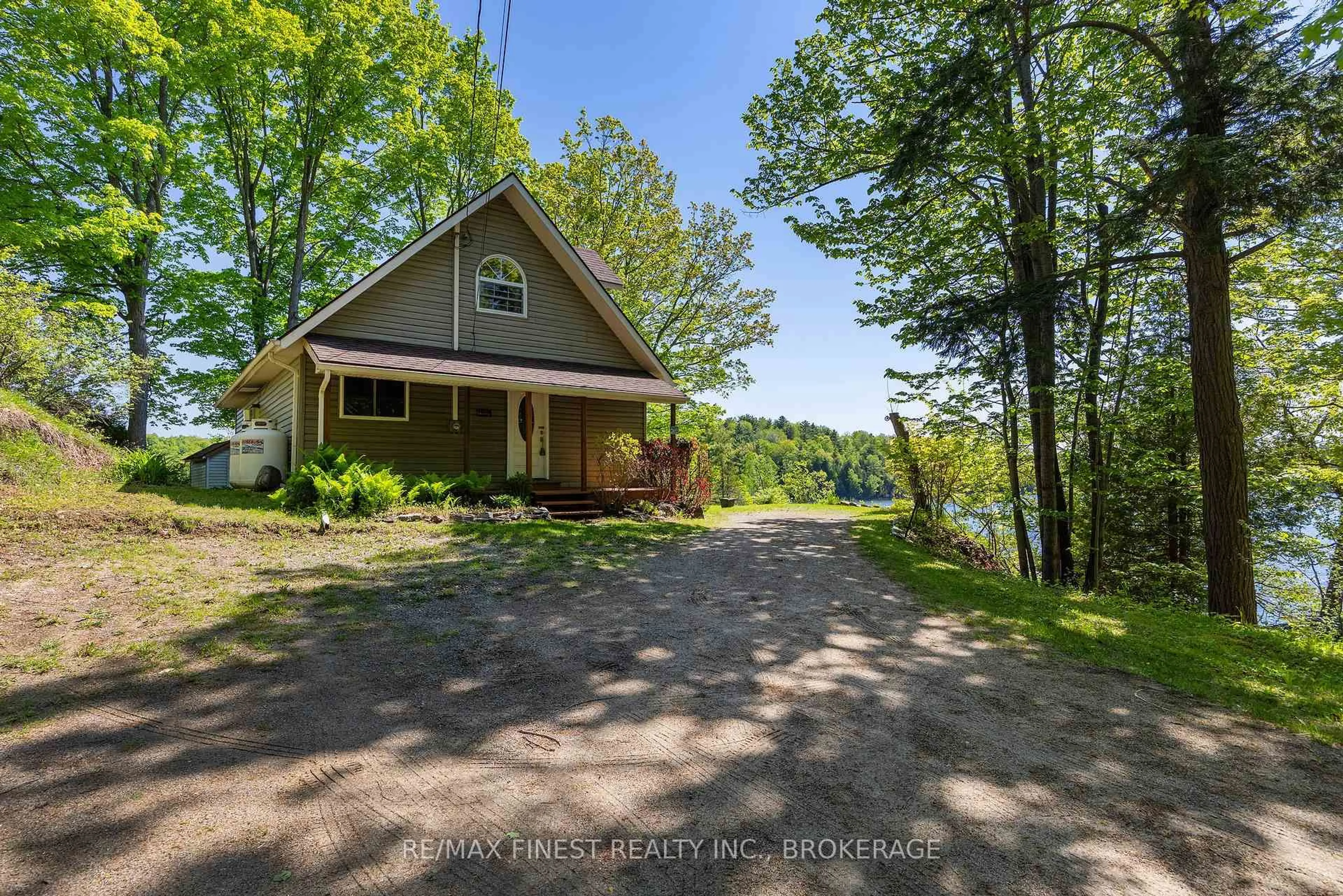 A pic from outside/outdoor area/front of a property/back of a property/a pic from drone, water/lake/river/ocean view for 308C Henry Lane, Godfrey Ontario K0H 1T0
