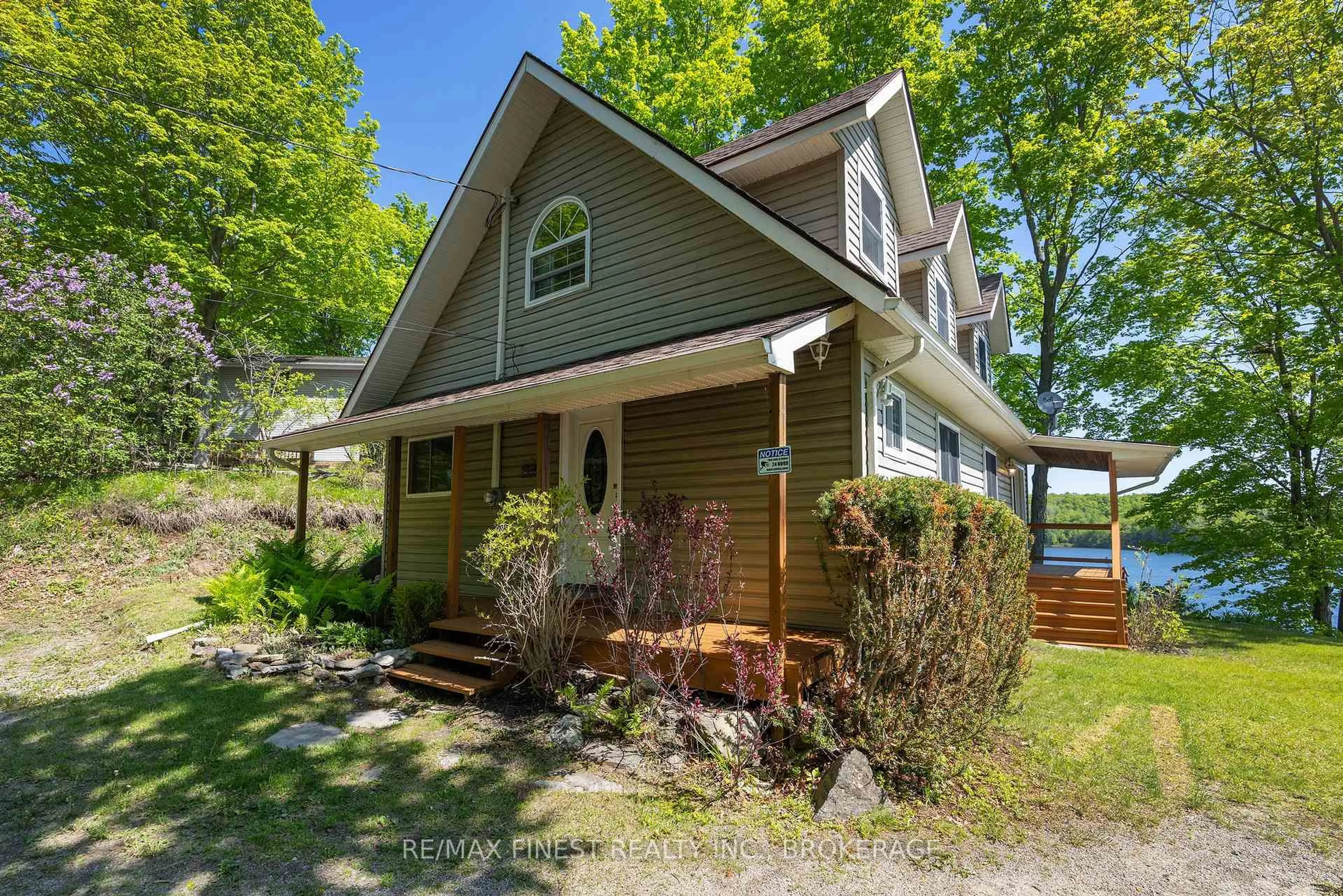 Home with vinyl exterior material, street for 308C Henry Lane, Godfrey Ontario K0H 1T0