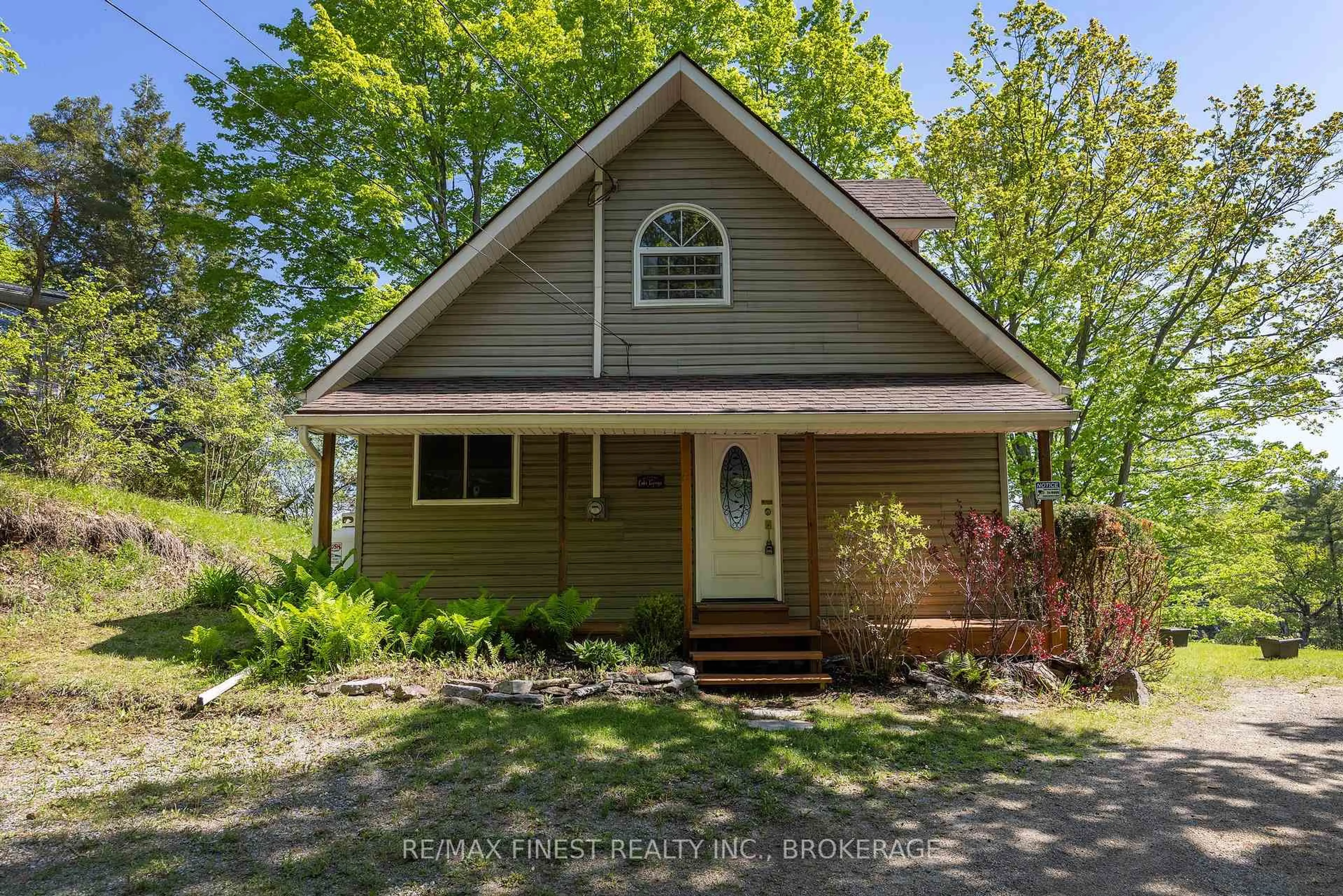 Home with vinyl exterior material, street for 308C Henry Lane, Godfrey Ontario K0H 1T0