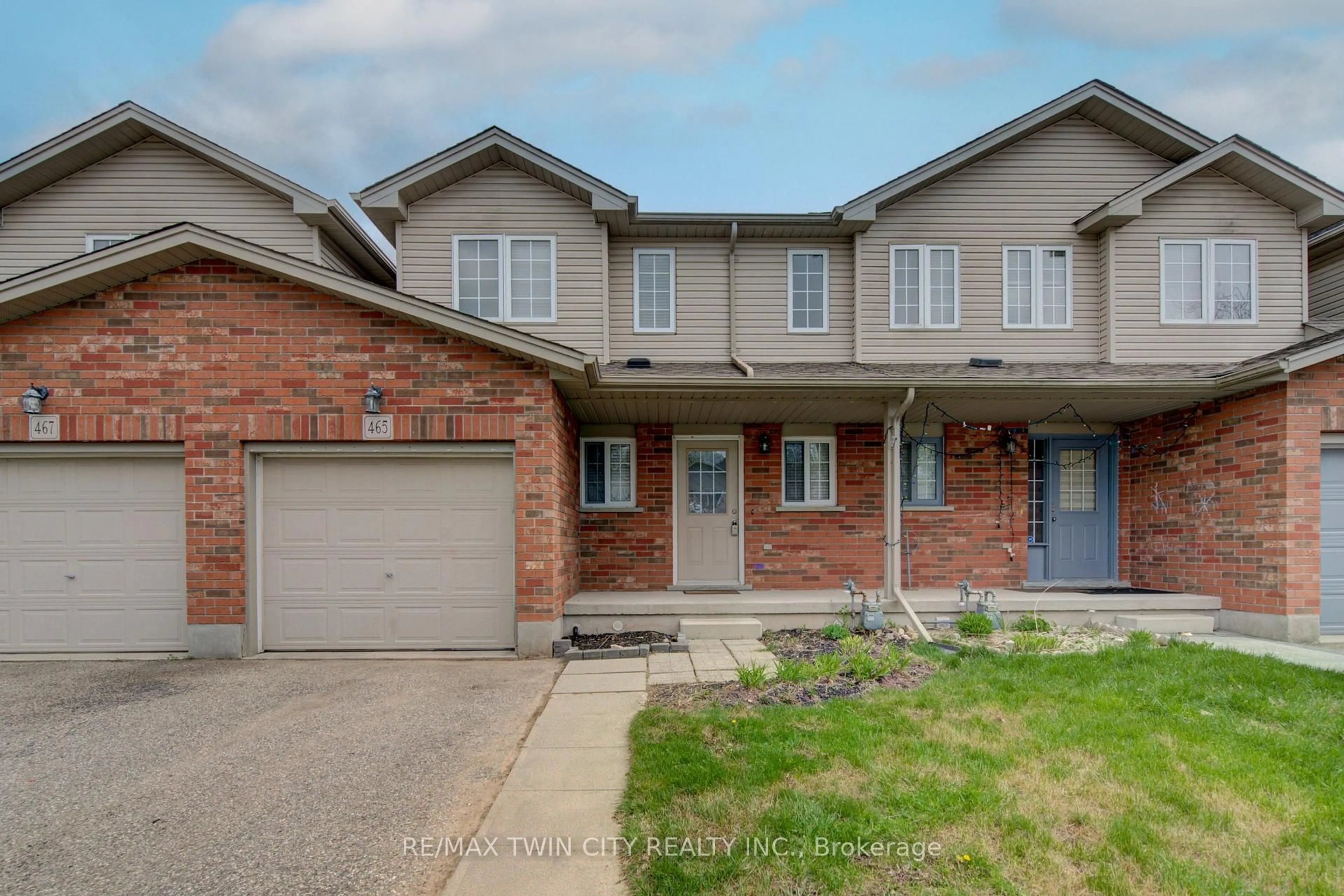 Home with brick exterior material, street for 465 Colt St, Waterloo Ontario N2K 4N8