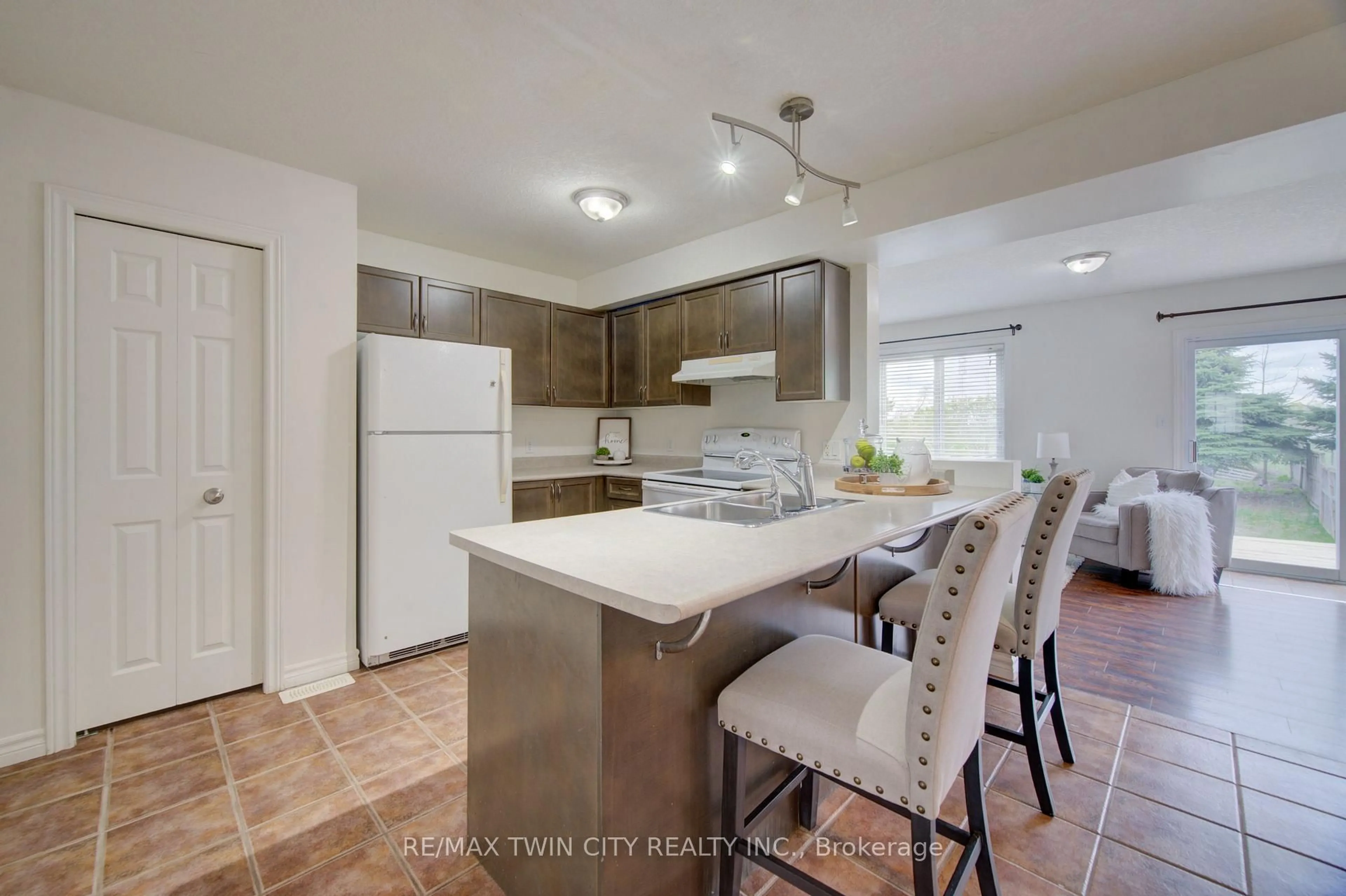 Open concept kitchen, ceramic/tile floor for 465 Colt St, Waterloo Ontario N2K 4N8