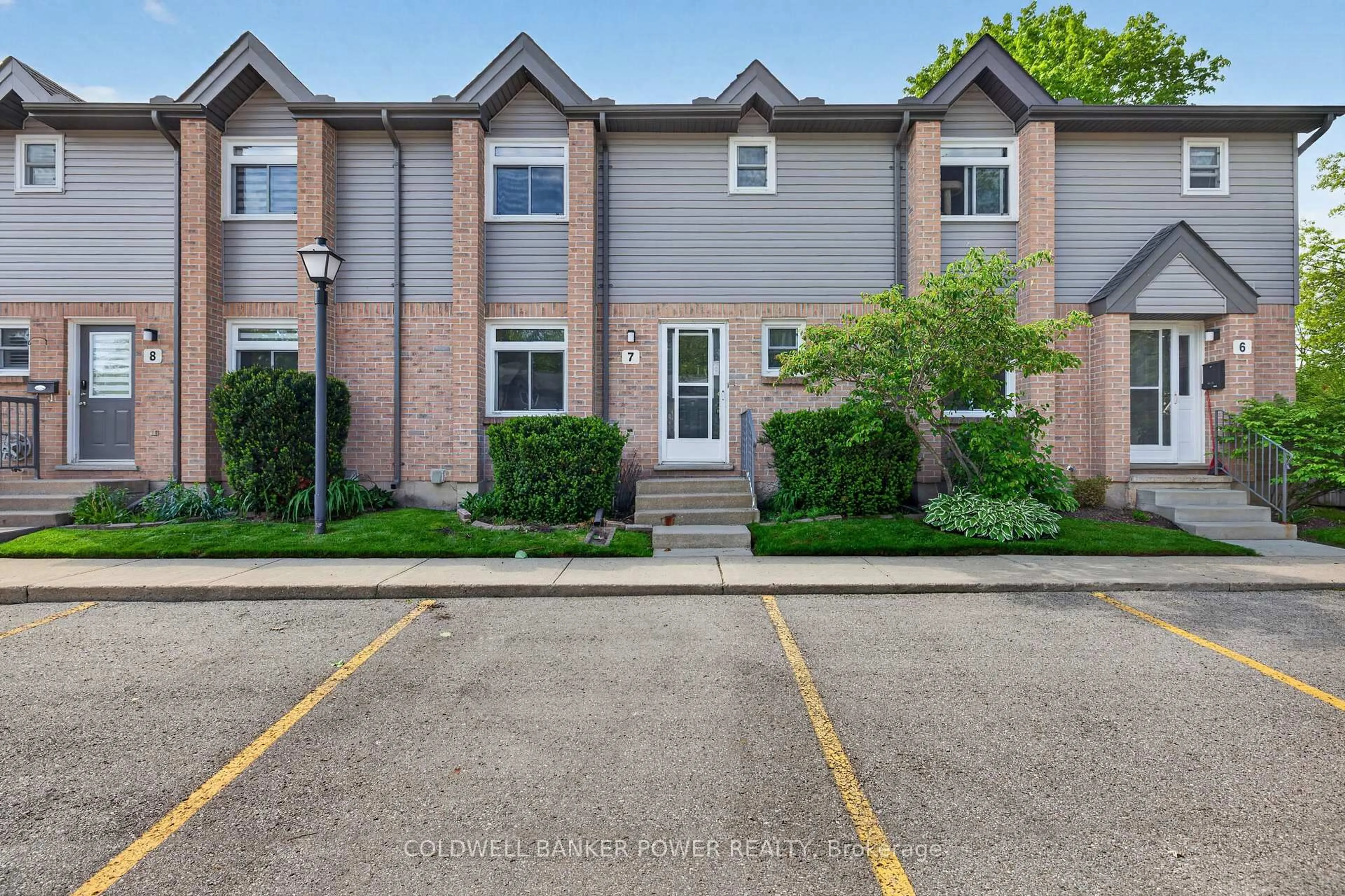 A pic from outside/outdoor area/front of a property/back of a property/a pic from drone, street for 1294 Byron Baseline Rd #7, London South Ontario N6K 4G8
