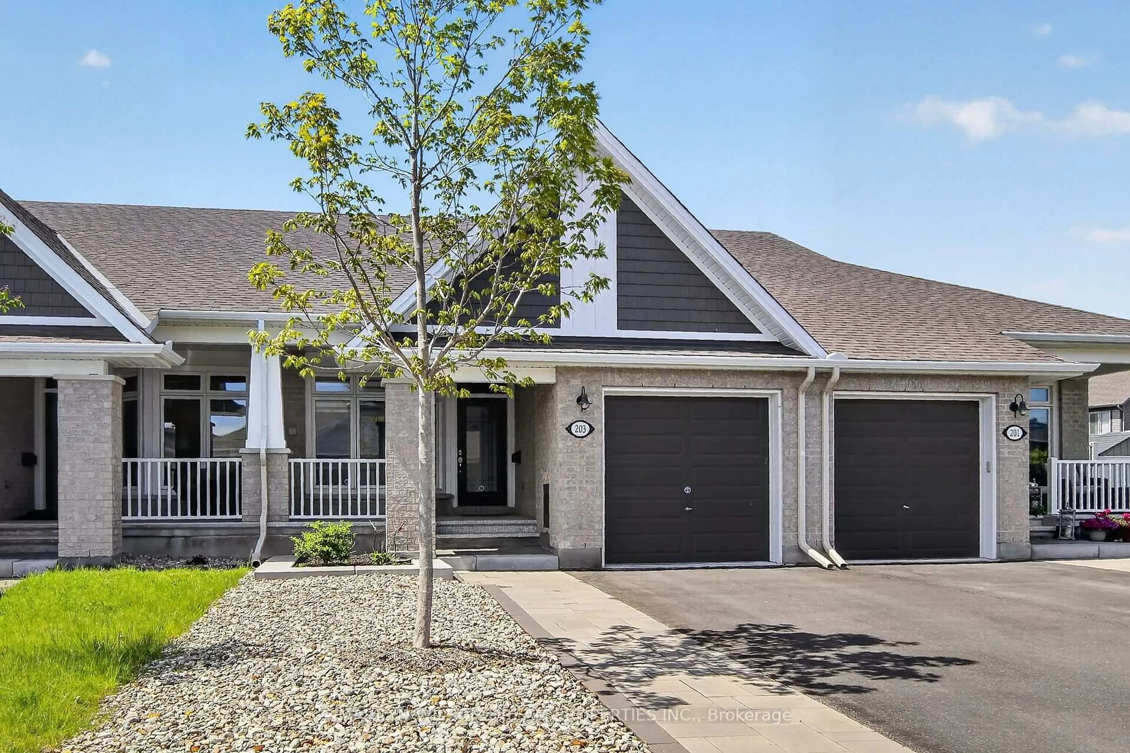 Home with vinyl exterior material, street for 203 Maygrass Way, Stittsville Ontario K2S 2K5