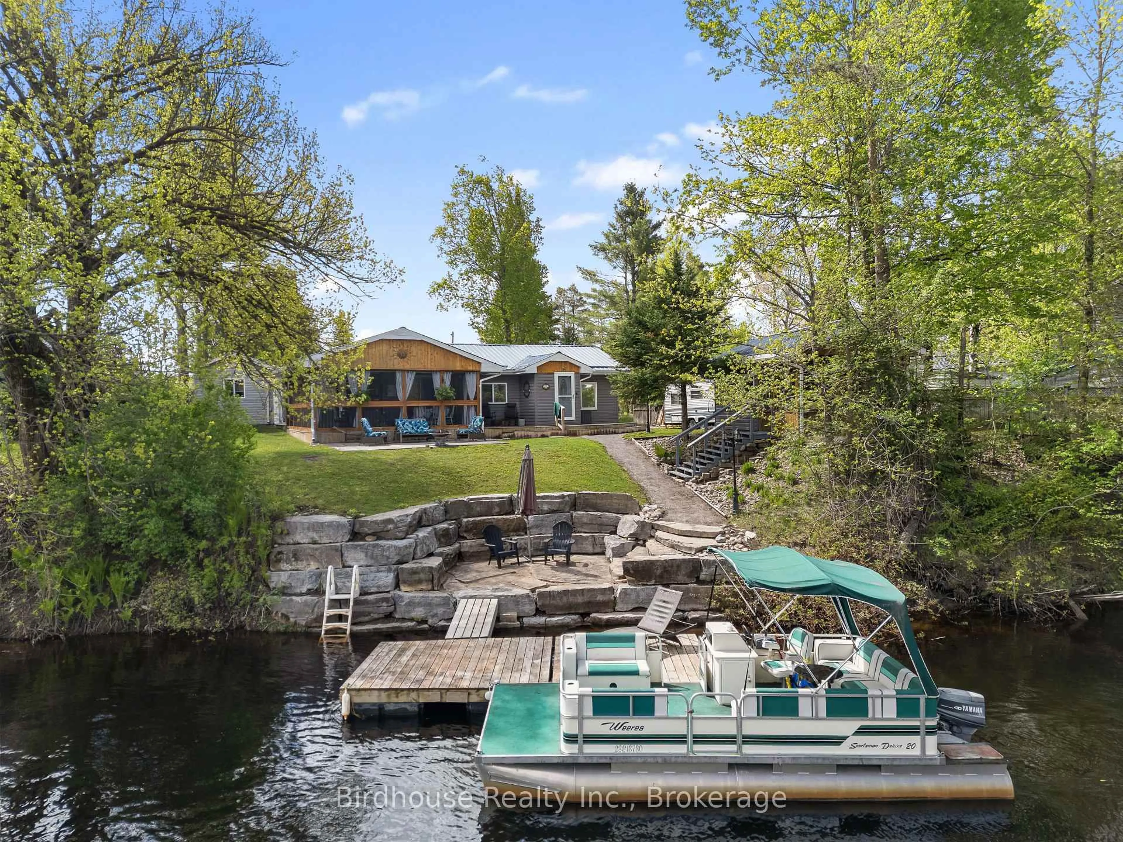 A pic from outside/outdoor area/front of a property/back of a property/a pic from drone, water/lake/river/ocean view for 57 Crooked Crt, Kawartha Lakes Ontario K0M 1C0