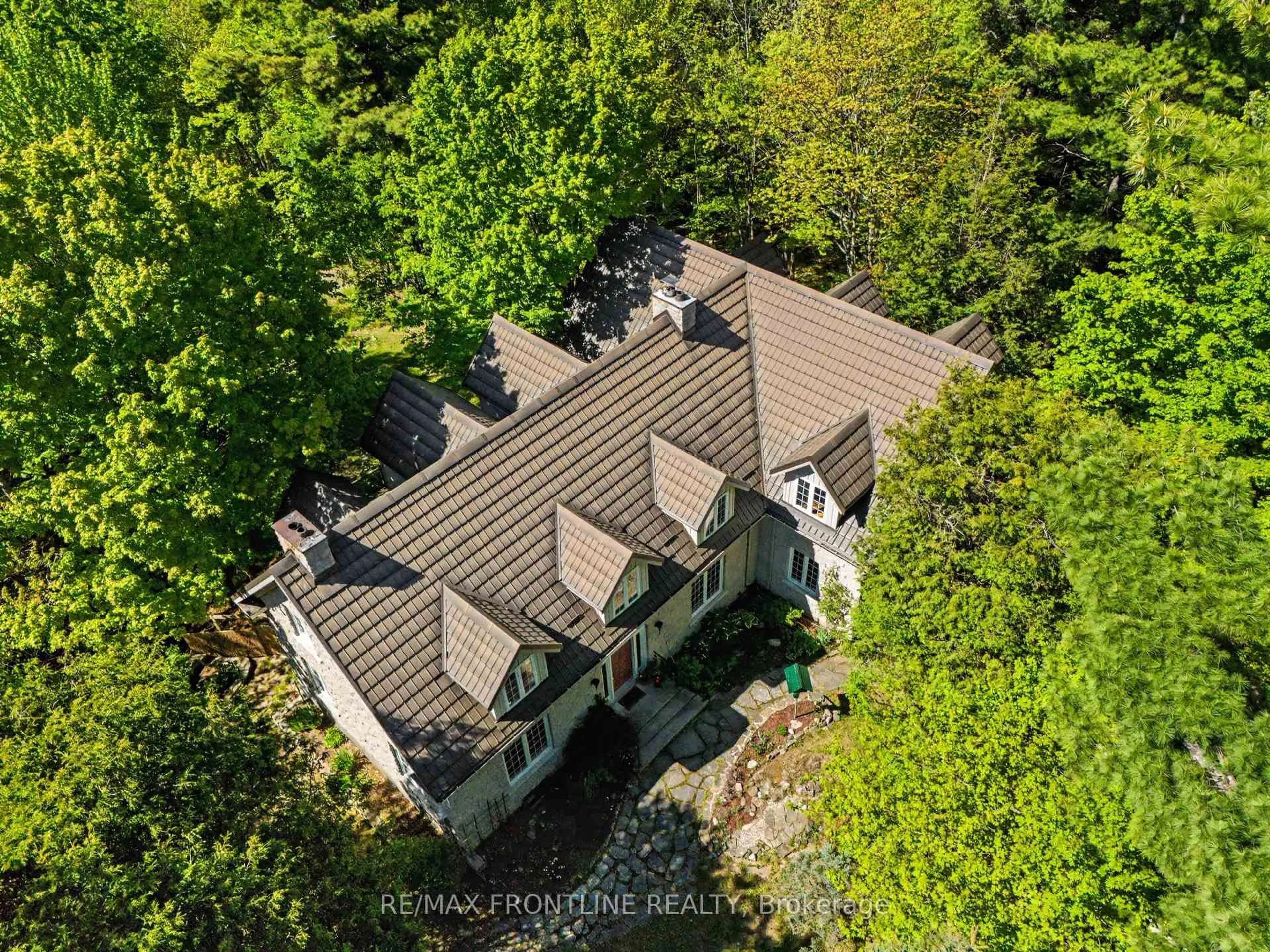 A pic from outside/outdoor area/front of a property/back of a property/a pic from drone, forest/trees view for 103 Healey Dr, Perth Ontario K7H 0H1