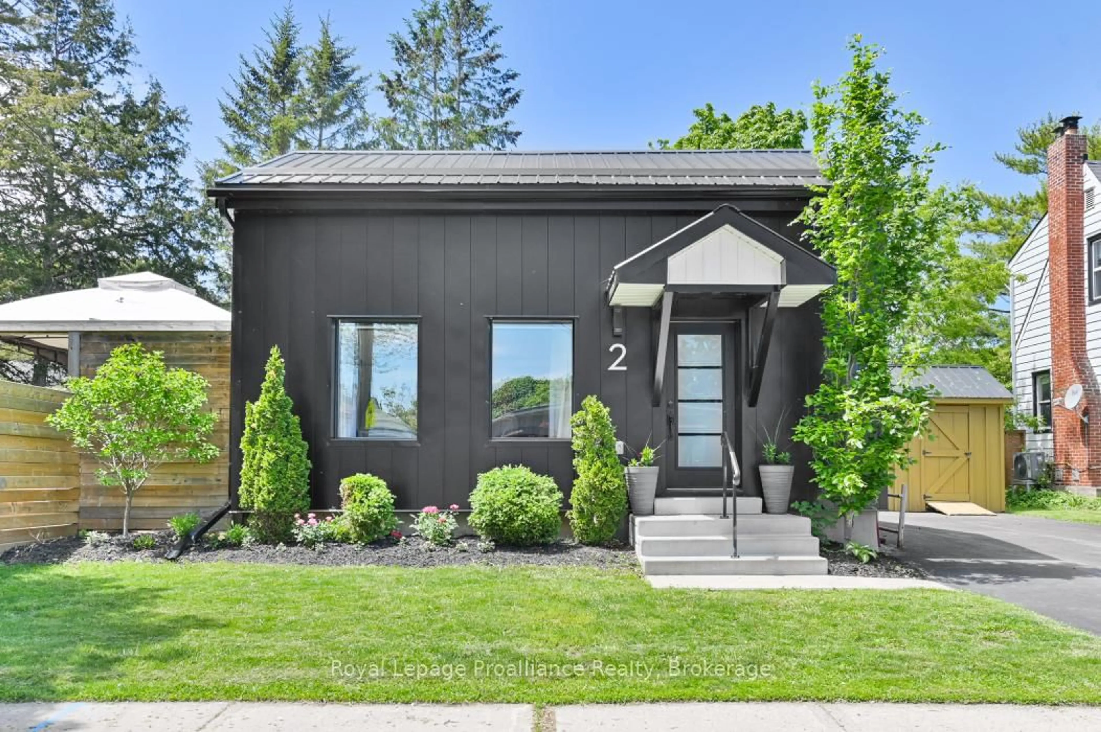 Home with brick exterior material, street for 2 Howard St, Belleville Ontario K8P 3S9