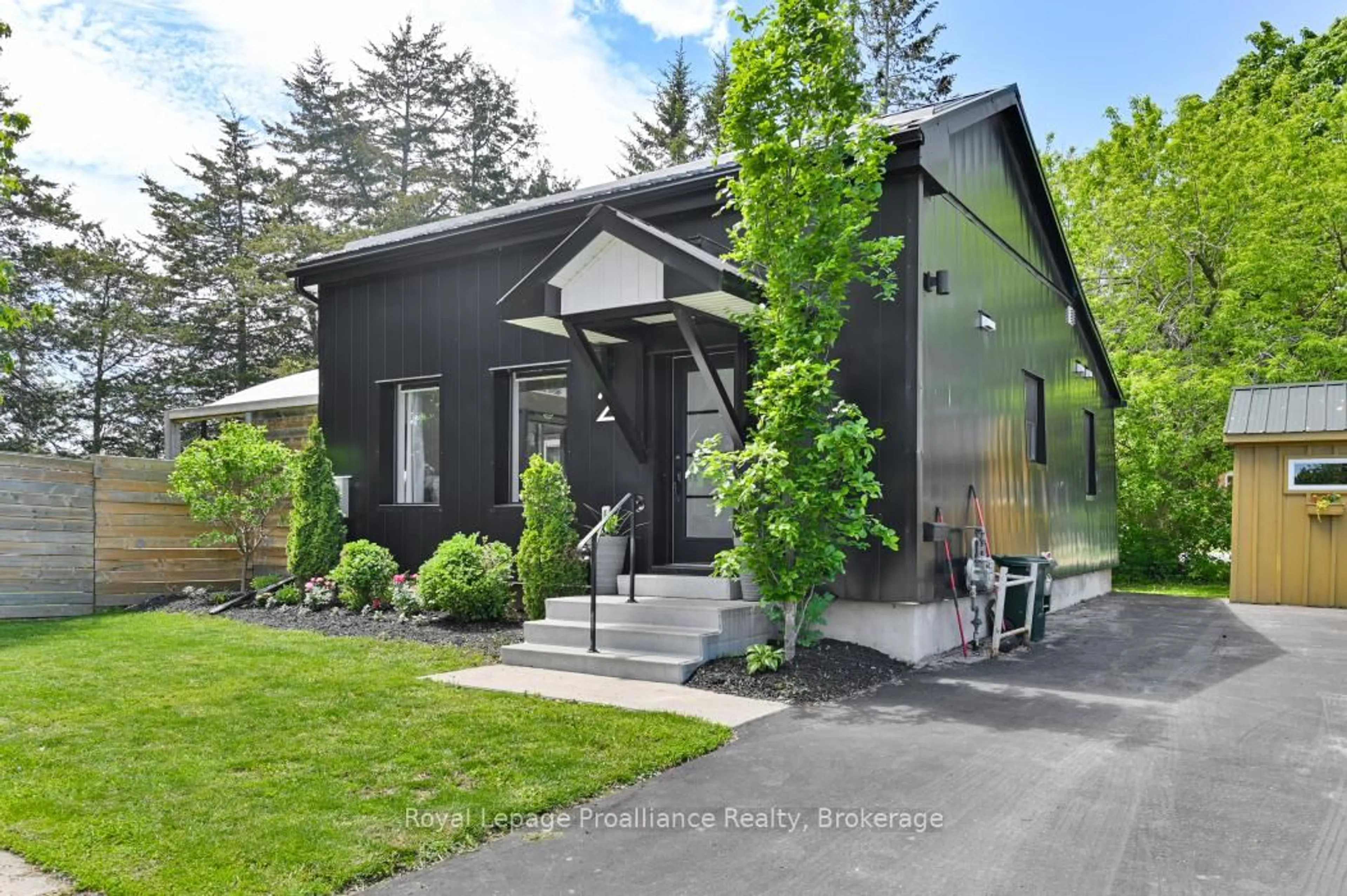 Home with vinyl exterior material, street for 2 Howard St, Belleville Ontario K8P 3S9