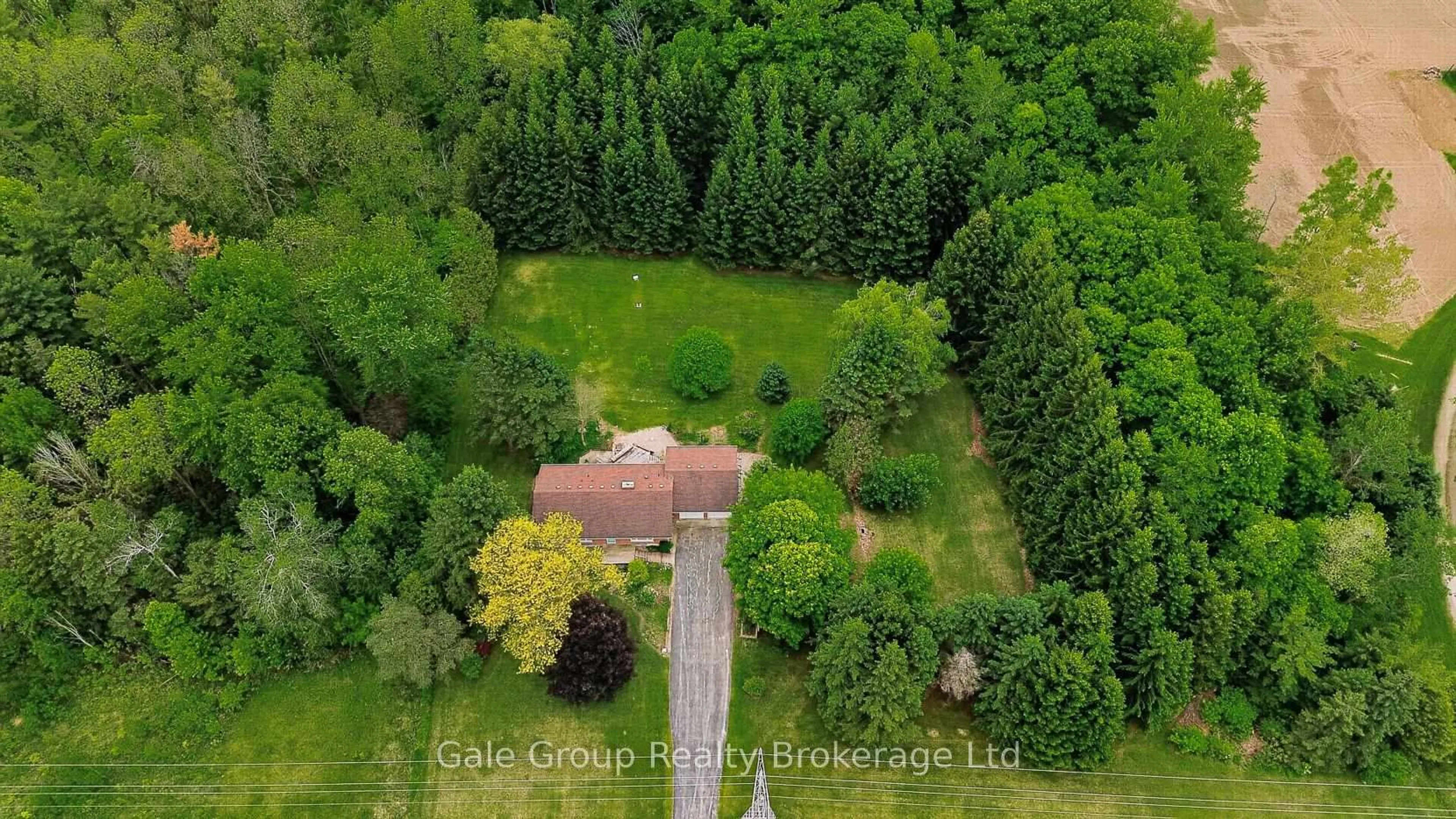 A pic from outside/outdoor area/front of a property/back of a property/a pic from drone, forest/trees view for 565912 Towerline Rd, Norwich Ontario N4S 7W3