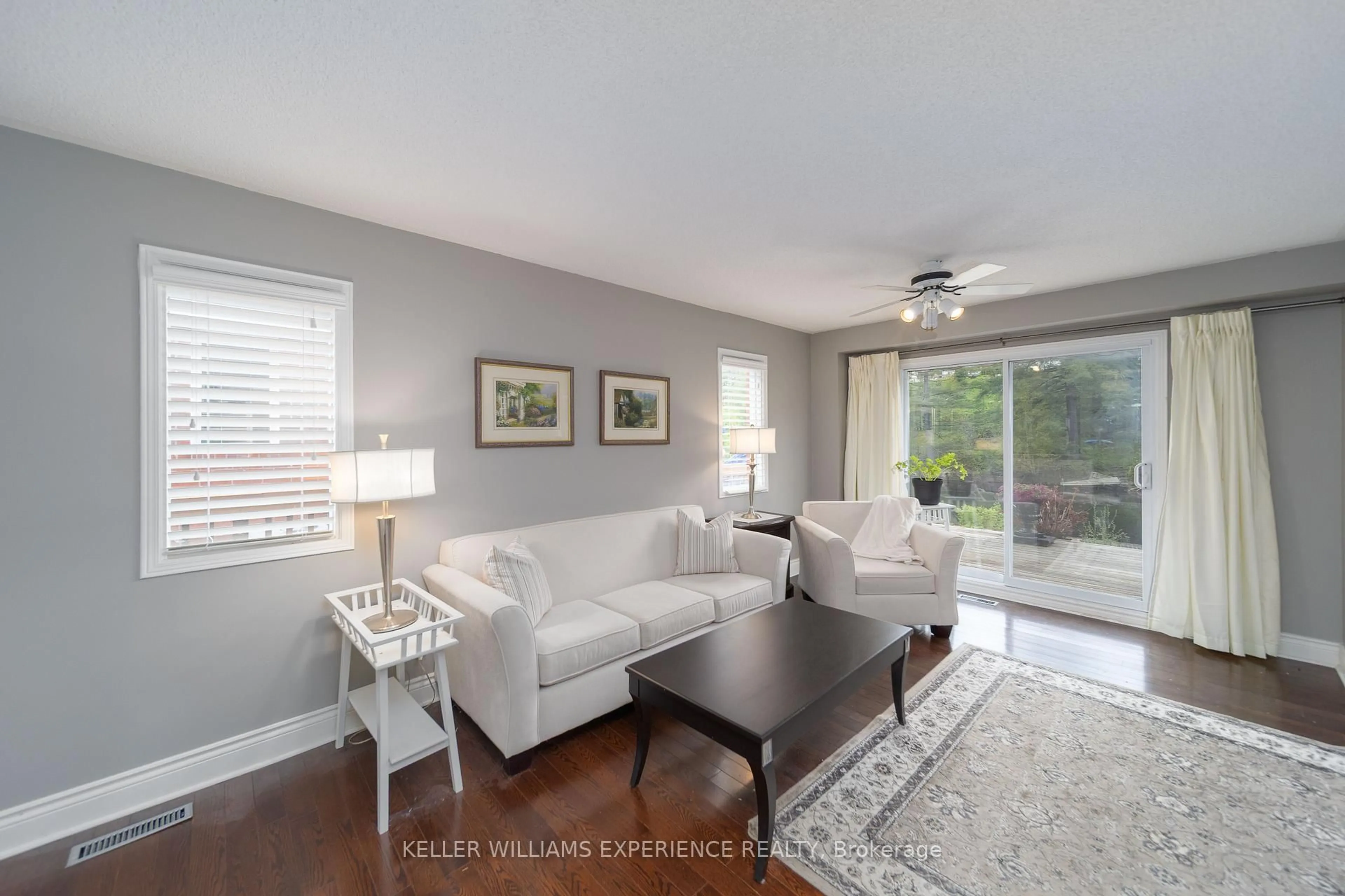 Living room with furniture, wood/laminate floor for 63 Shoreline Dr, Bracebridge Ontario P1L 1Z3