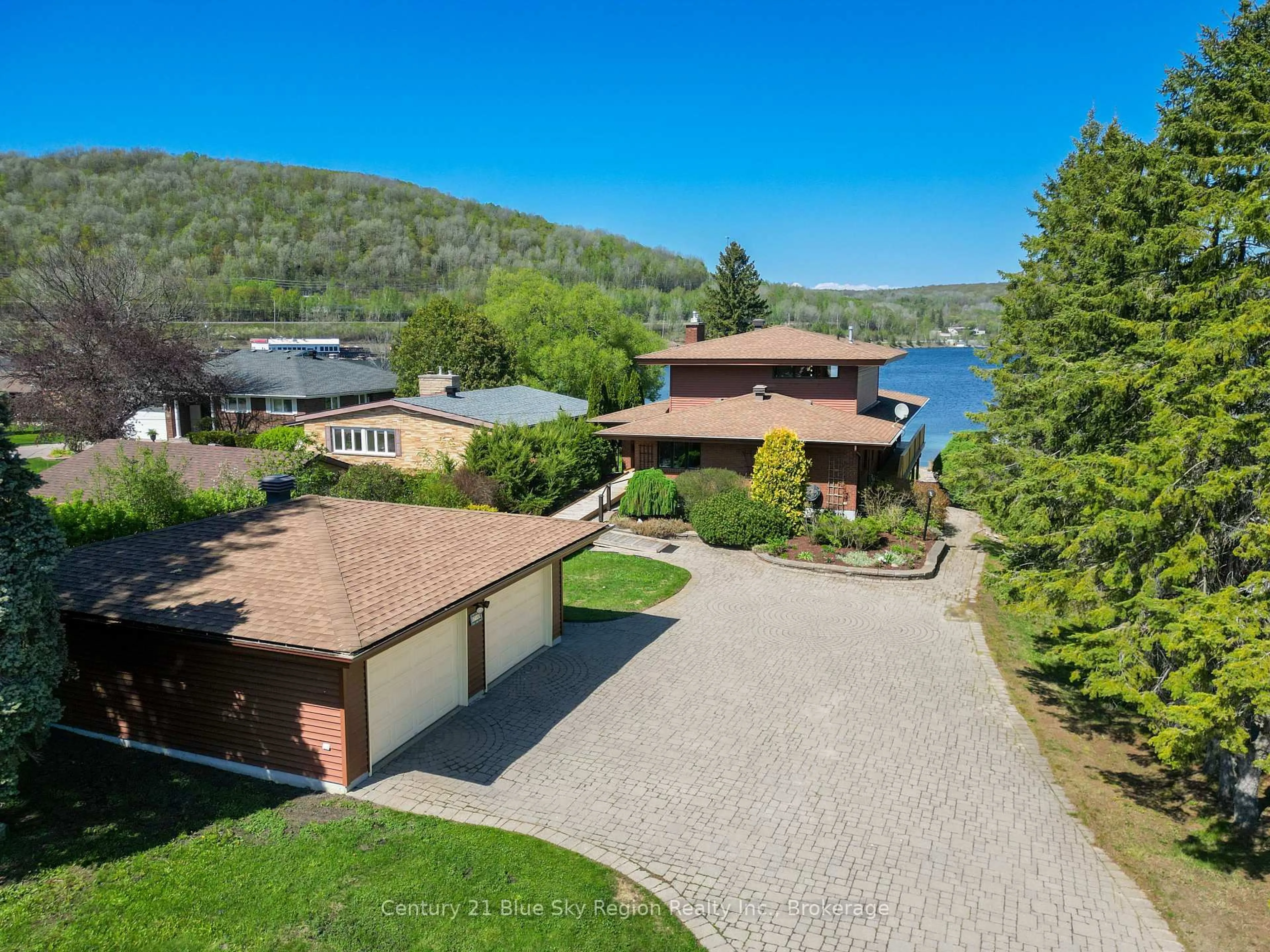 A pic from outside/outdoor area/front of a property/back of a property/a pic from drone, water/lake/river/ocean view for 204 Lakeside Dr, North Bay Ontario P1A 3E3