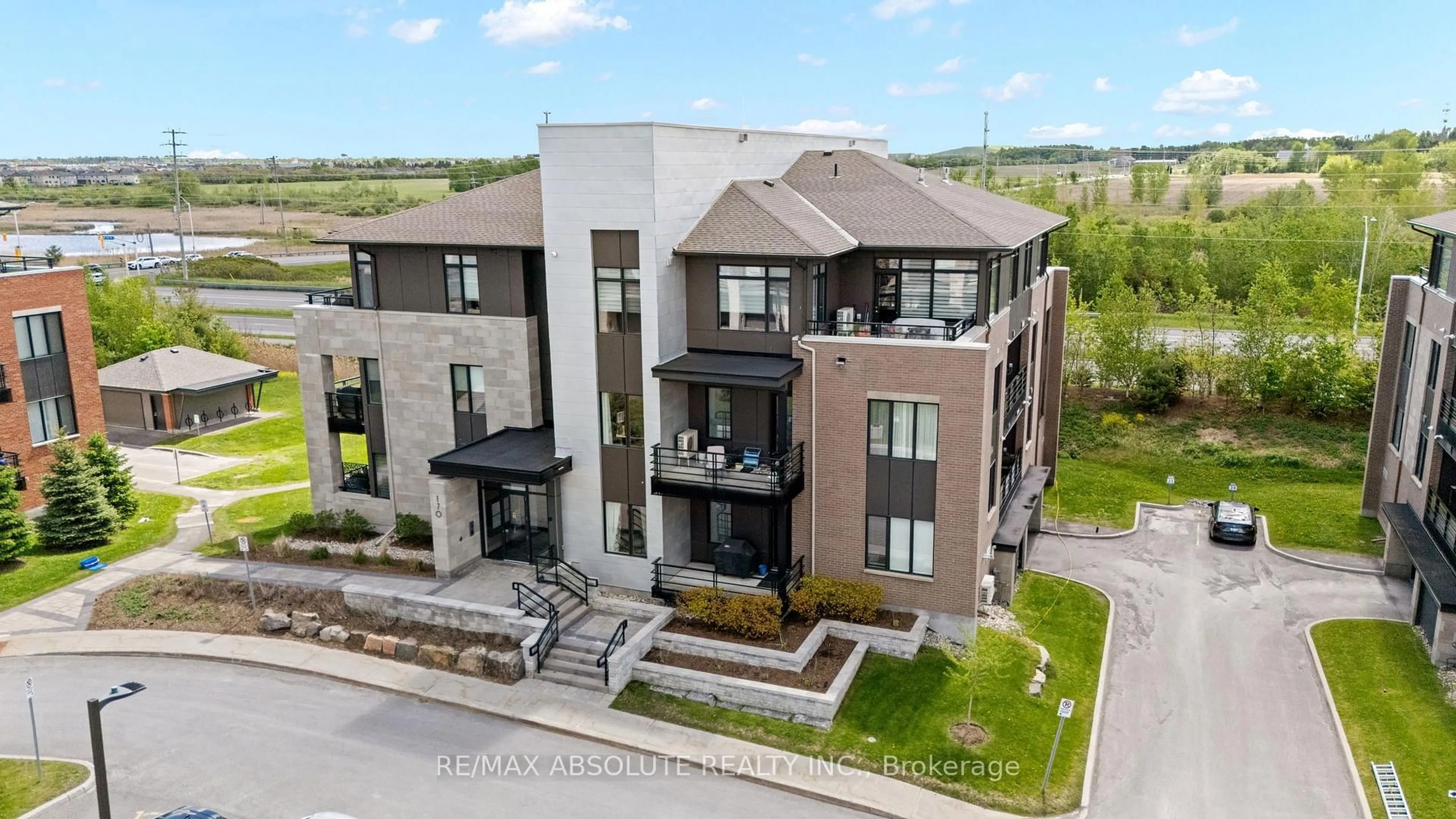 A pic from outside/outdoor area/front of a property/back of a property/a pic from drone, building for 170 Boundstone Way #304, Ottawa Ontario K2T 0M8