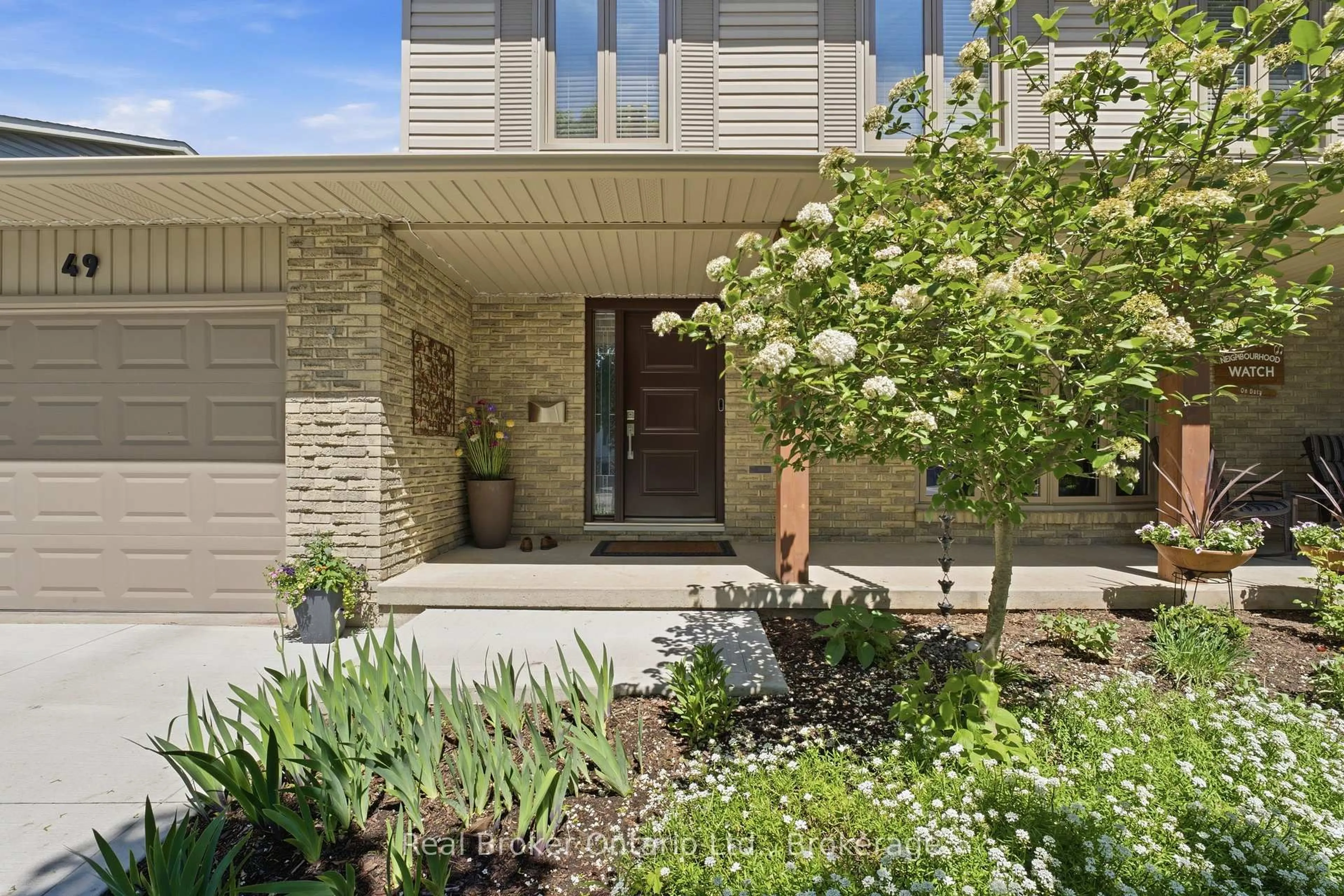 Home with brick exterior material, street for 49 Greenfield Rd, Brantford Ontario N3R 6Z4