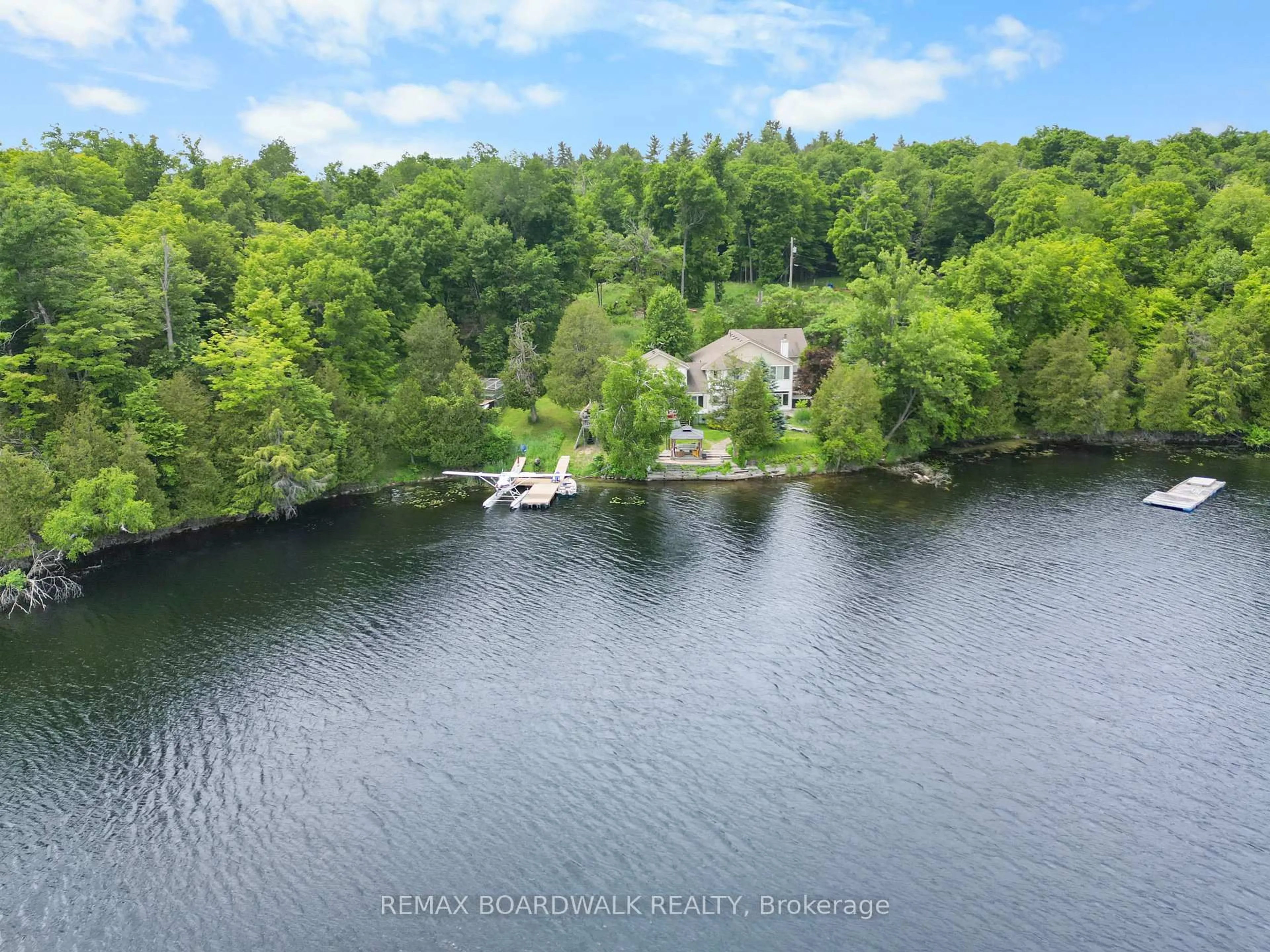 A pic from outside/outdoor area/front of a property/back of a property/a pic from drone, water/lake/river/ocean view for 101 Arthur Rd, Maberly Ontario K0H 2B0