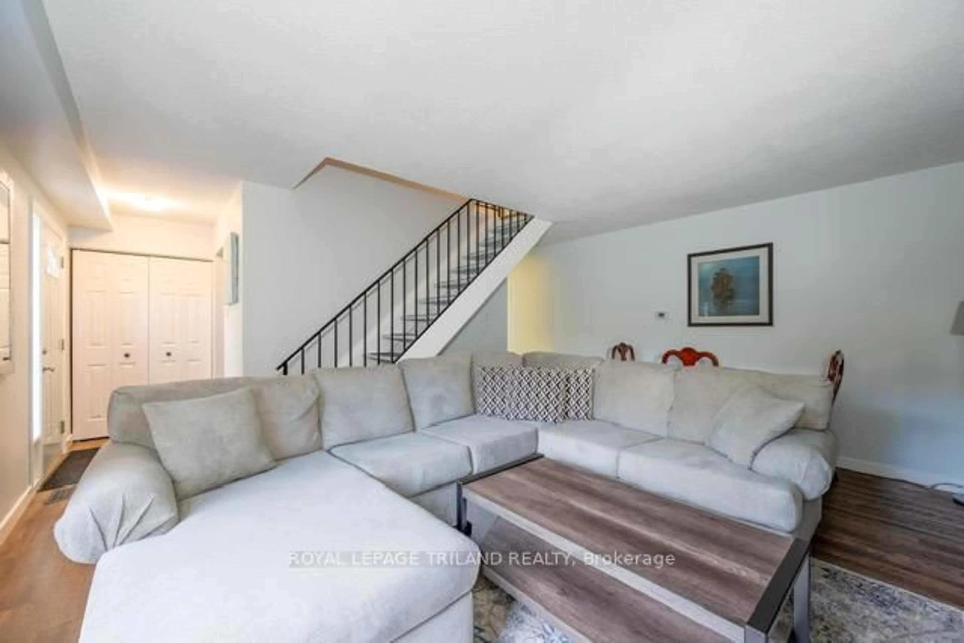 Living room with furniture, unknown for 70 Fiddlers Green Rd #104, London North Ontario N6H 4R4
