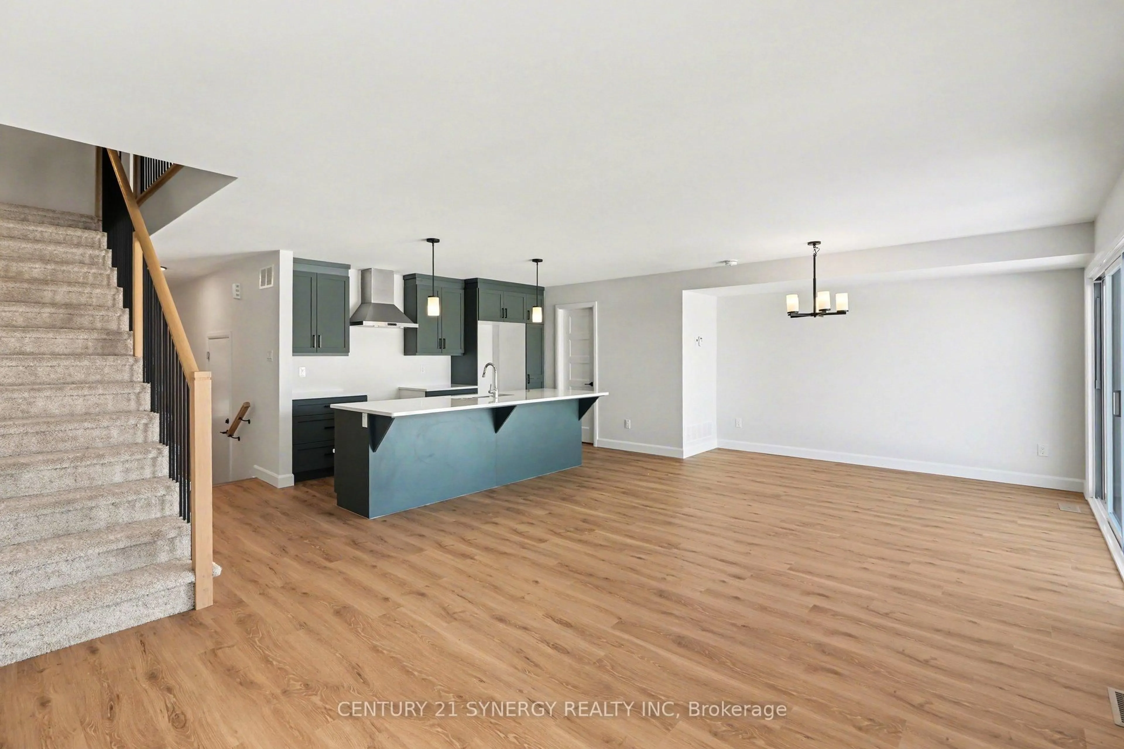 Open concept kitchen, wood/laminate floor for 38 Nicole St, North Stormont Ontario K0A 1R0