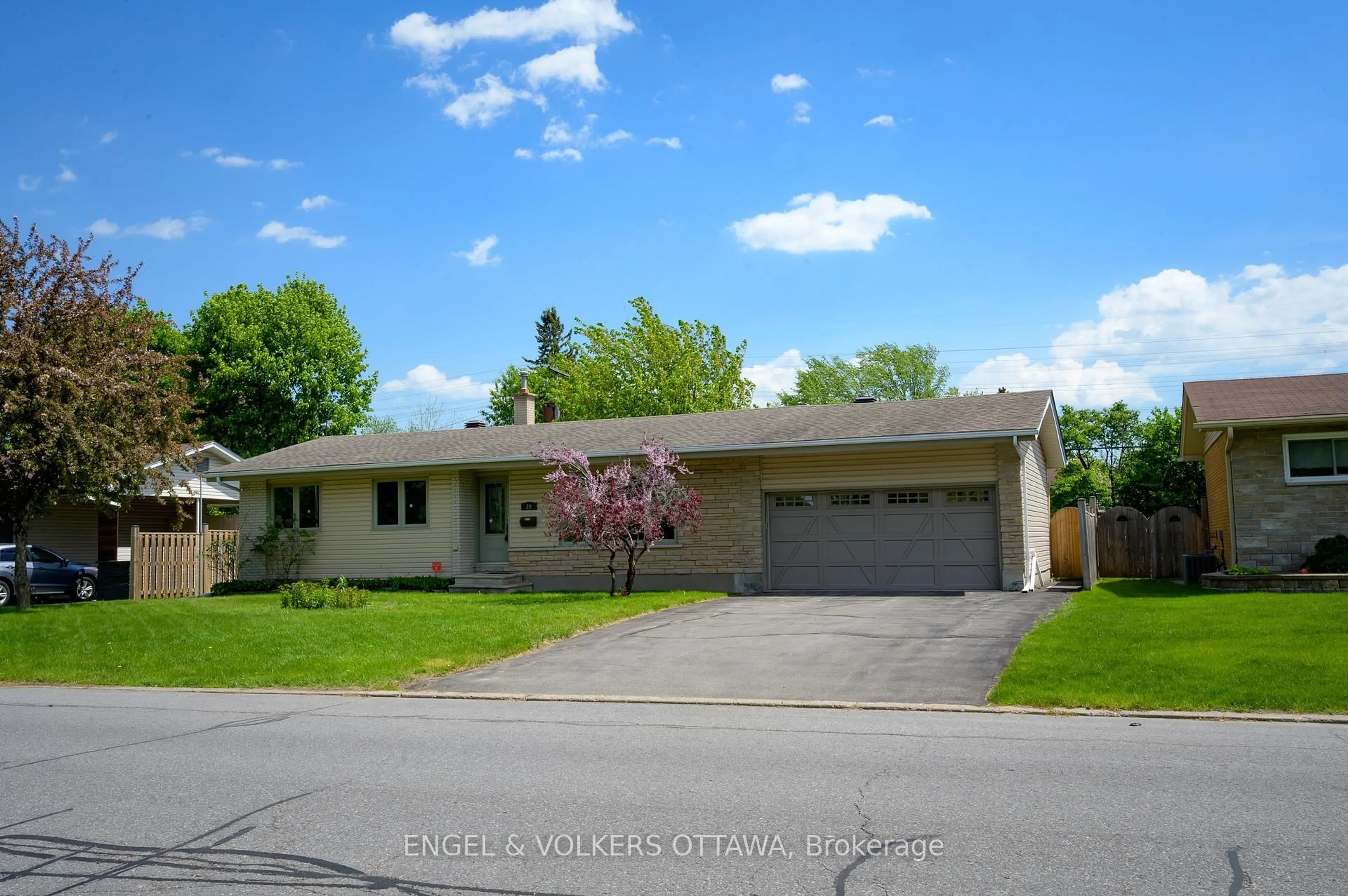 Home with vinyl exterior material, street for 20 Majestic Dr, Ottawa Ontario K2G 1C7