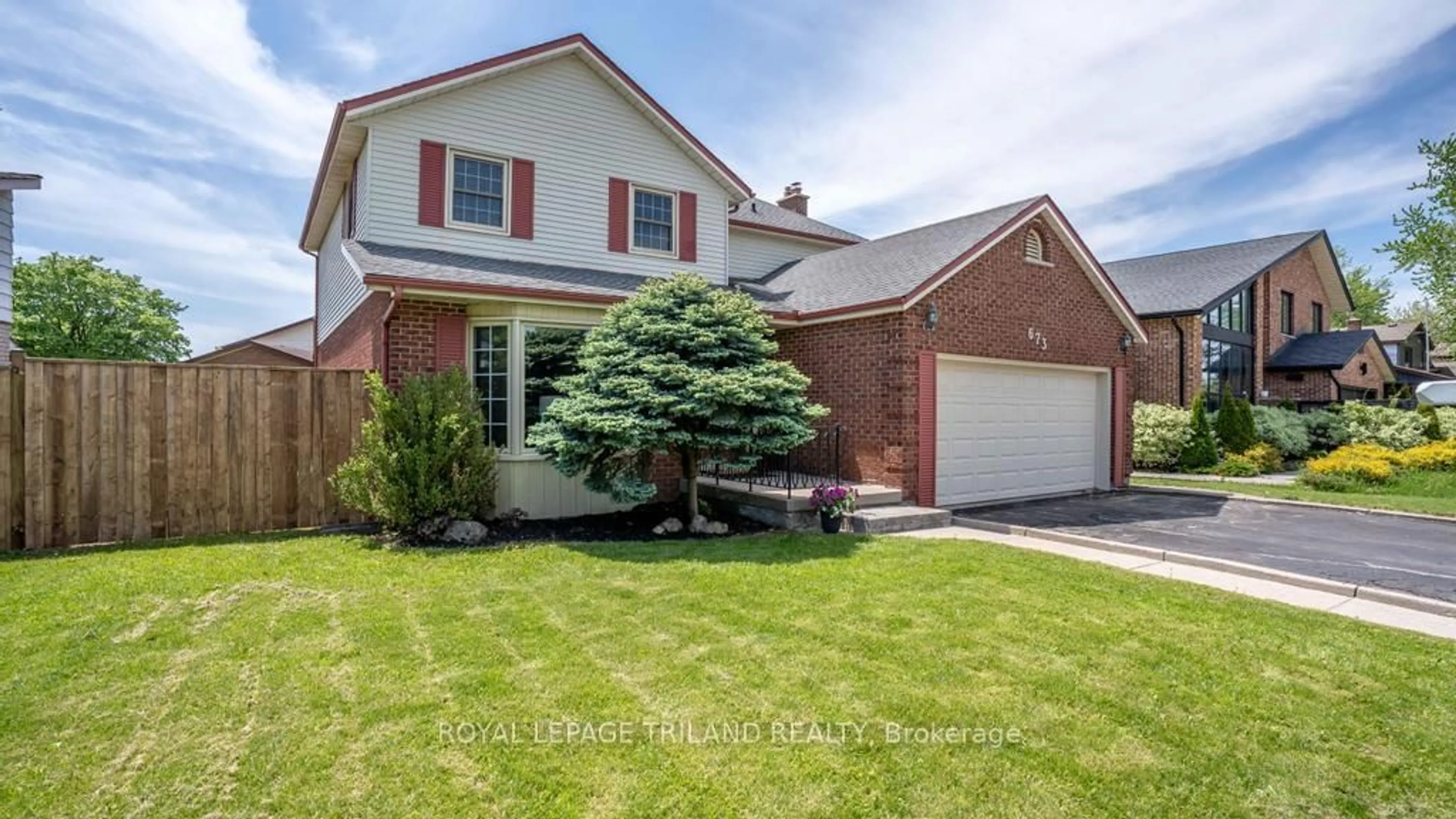 Home with brick exterior material, street for 673 UPPER QUEEN St, London South Ontario N6C 5C3