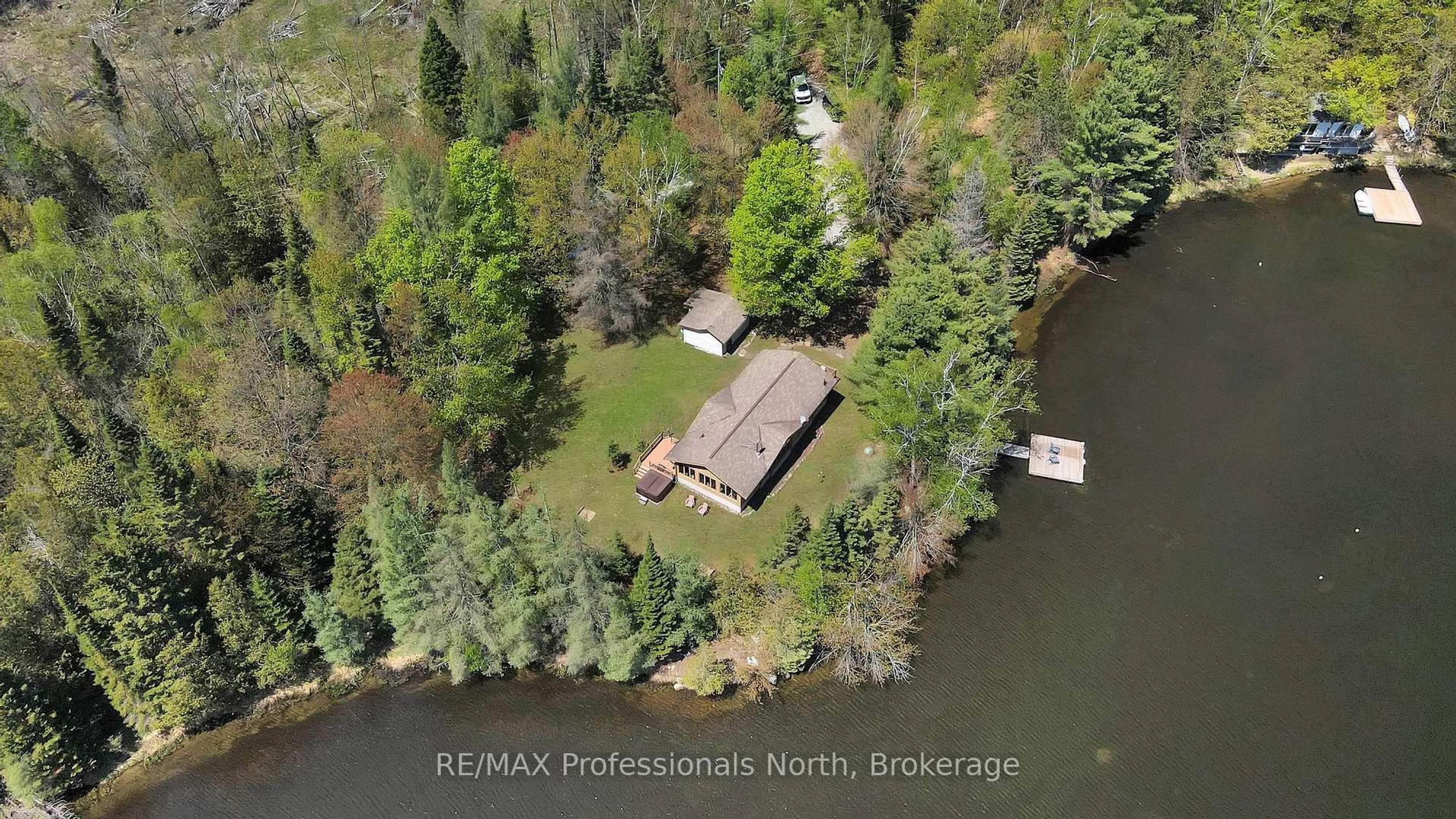 A pic from outside/outdoor area/front of a property/back of a property/a pic from drone, water/lake/river/ocean view for 1366 Hospitality Rd, Minden Hills Ontario K0M 2K0